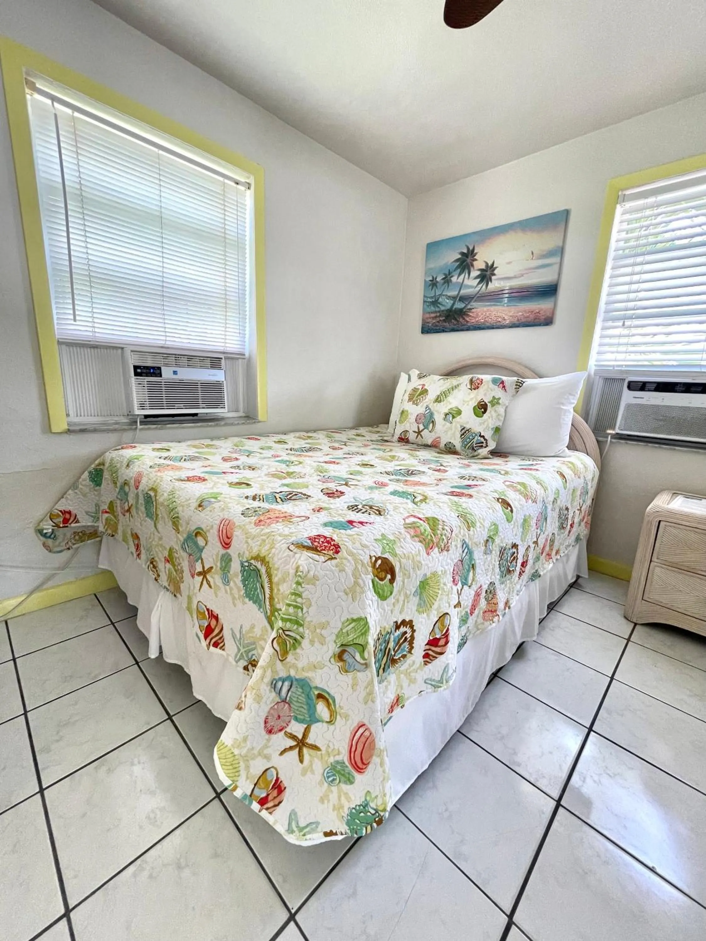 Bed in Coconut Cove Resort & Marina