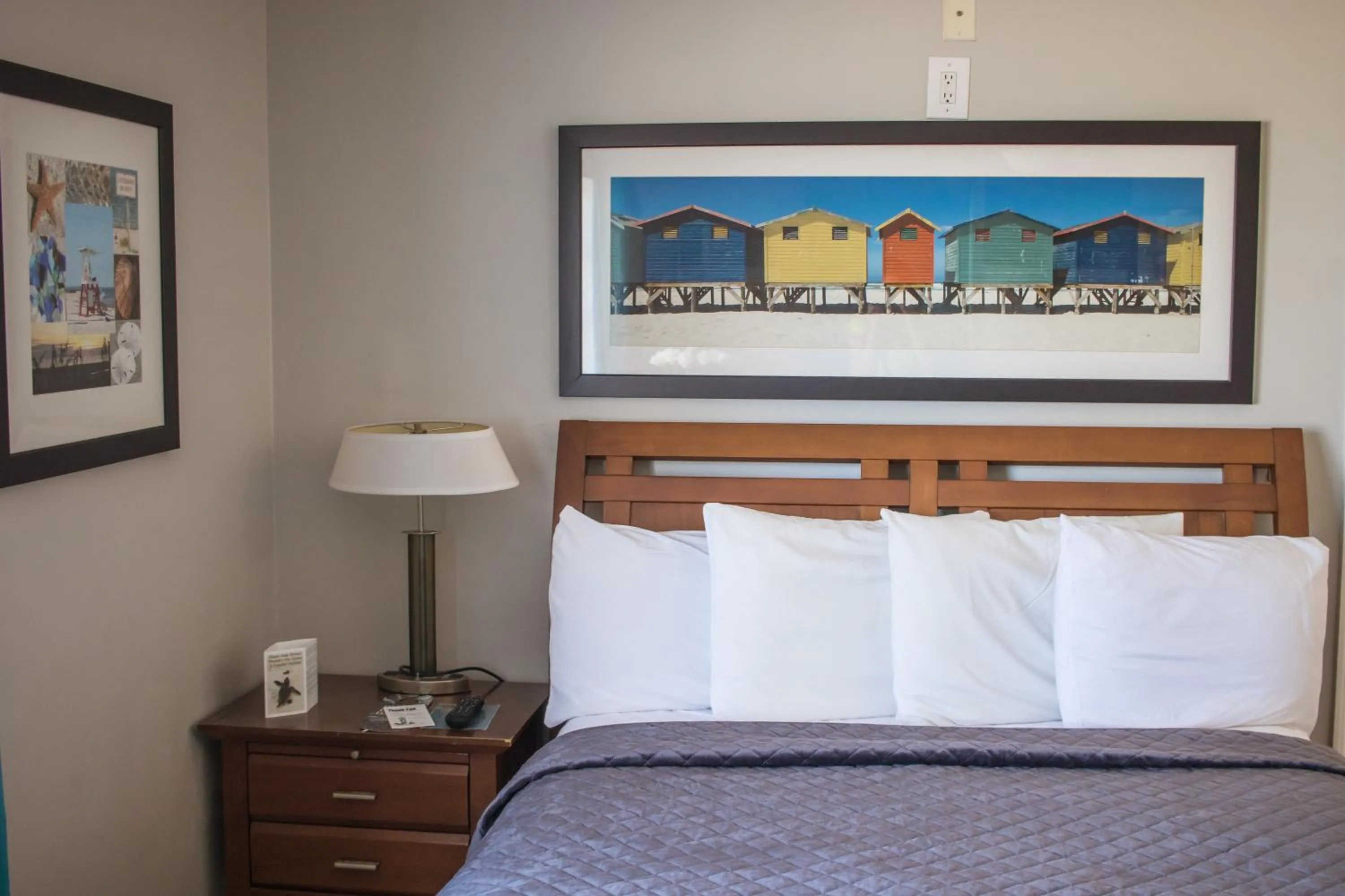 Bed in Riptide Oceanfront Hotel