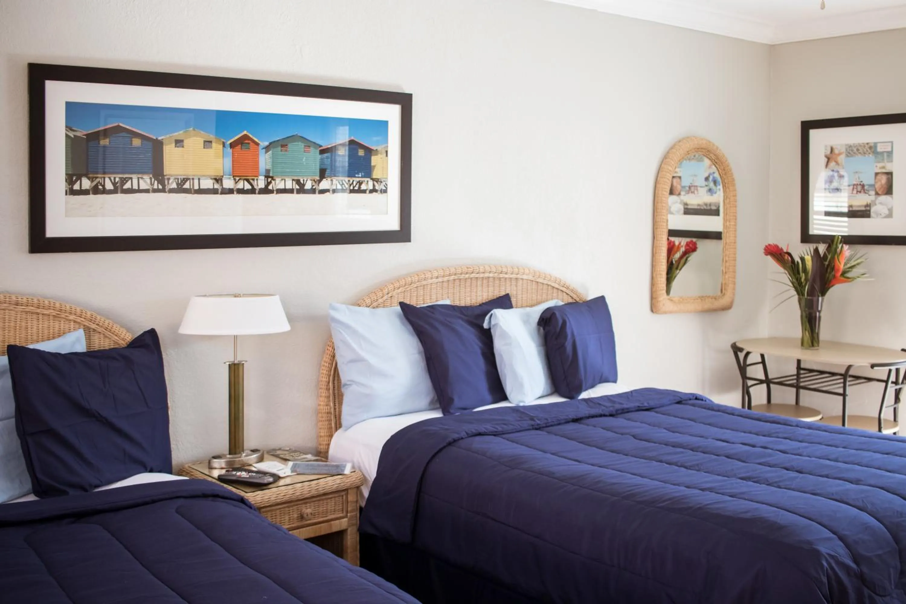 Bed in Riptide Oceanfront Hotel