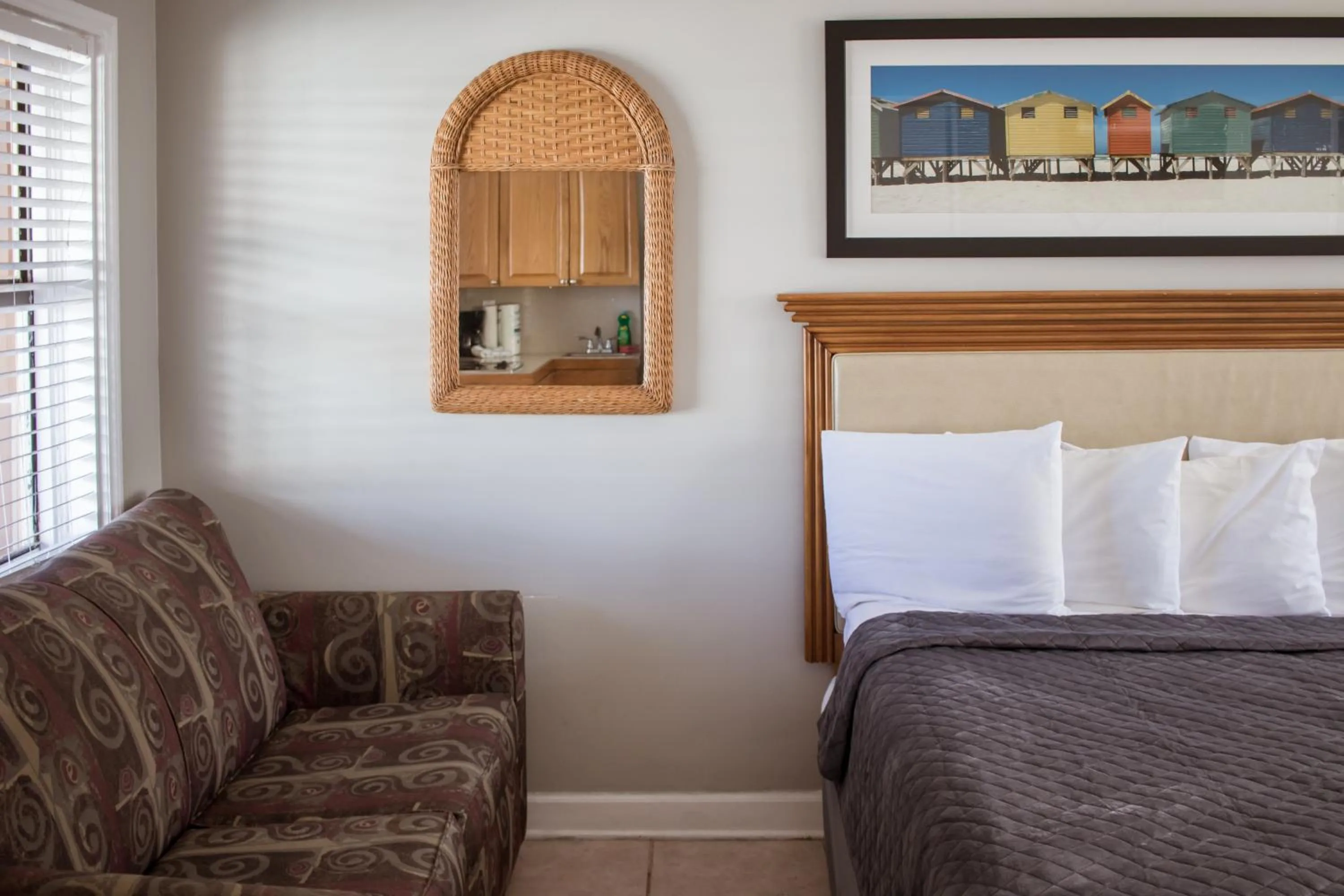 Bed in Riptide Oceanfront Hotel