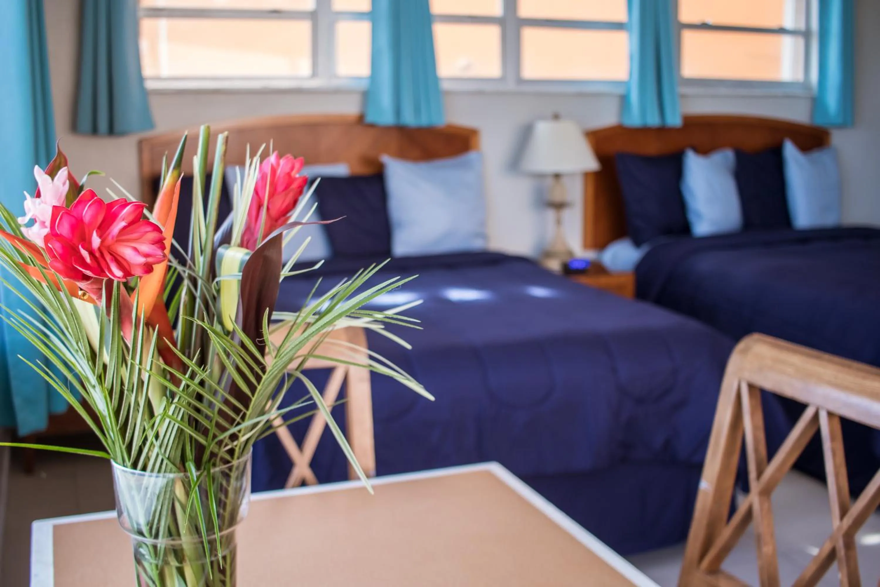 Bed in Riptide Oceanfront Hotel