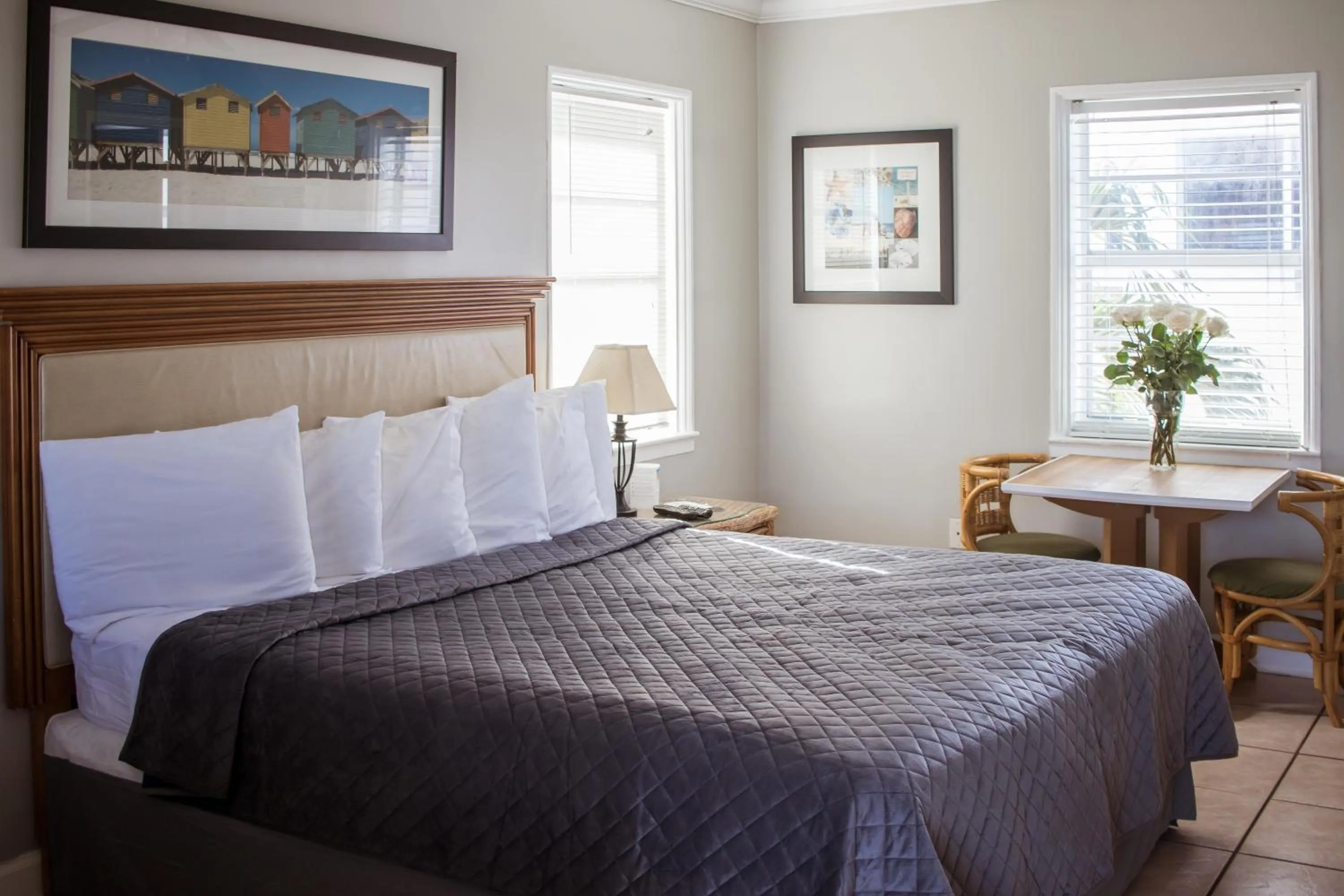 Bed in Riptide Oceanfront Hotel