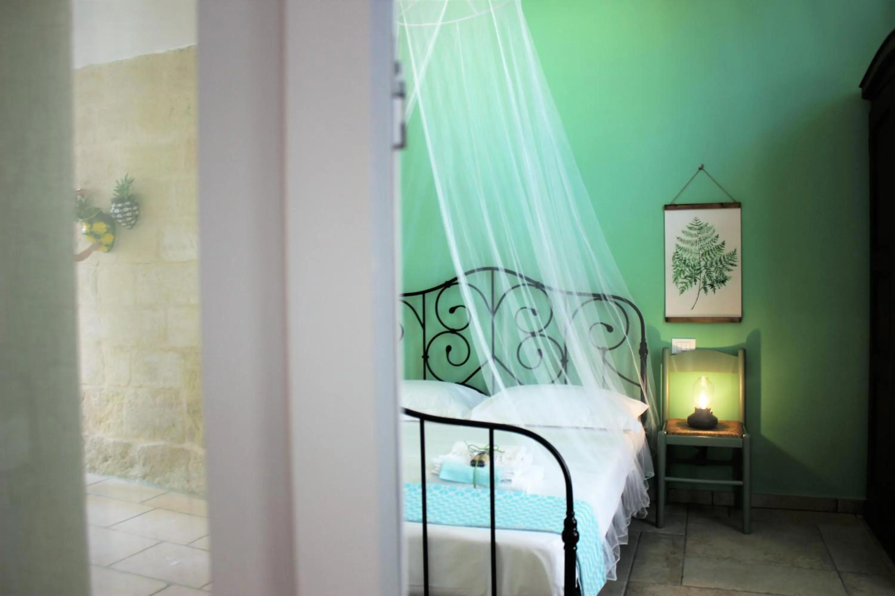 Bed in Li Perrini Boutique B&B