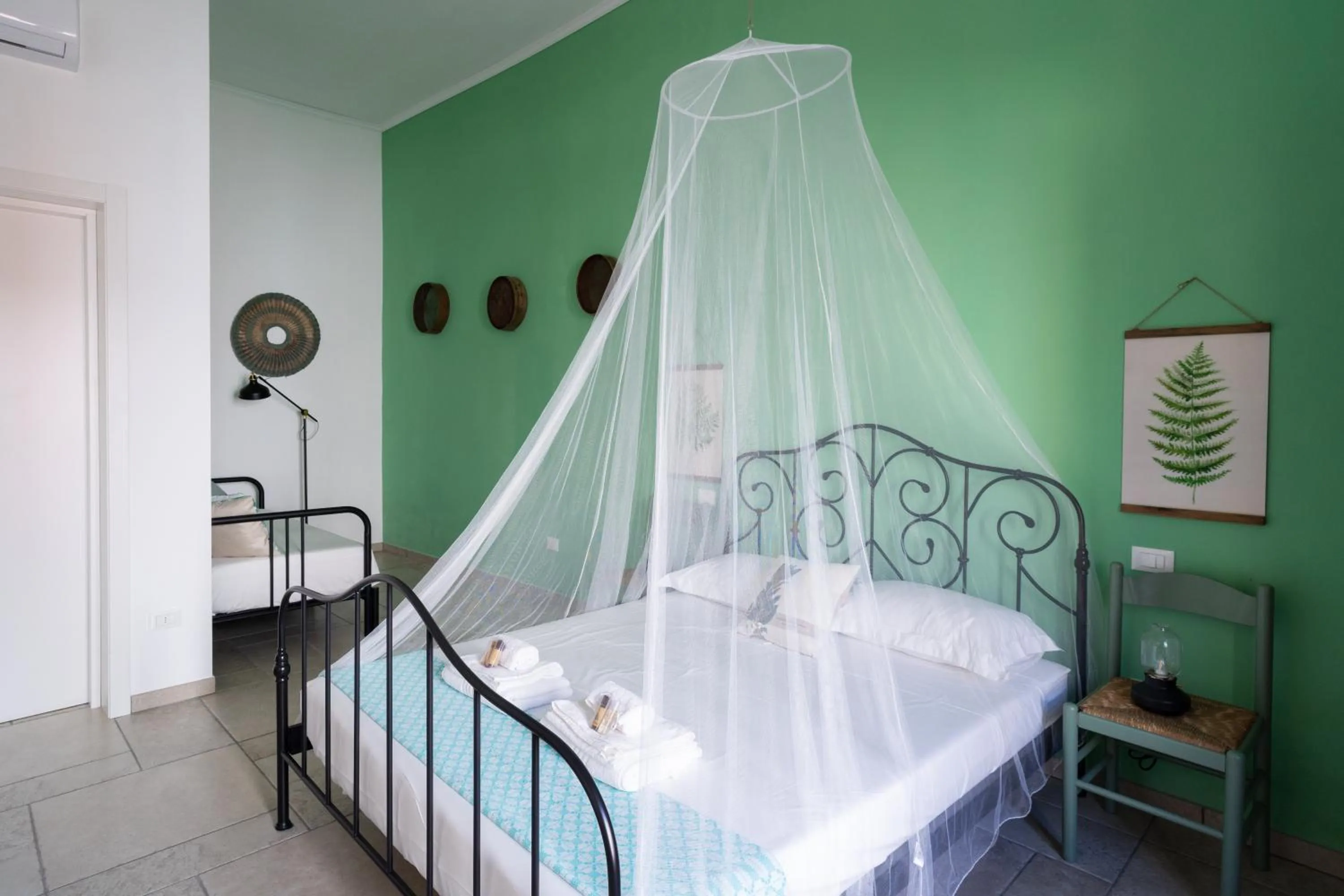 Bed in Li Perrini Boutique B&B