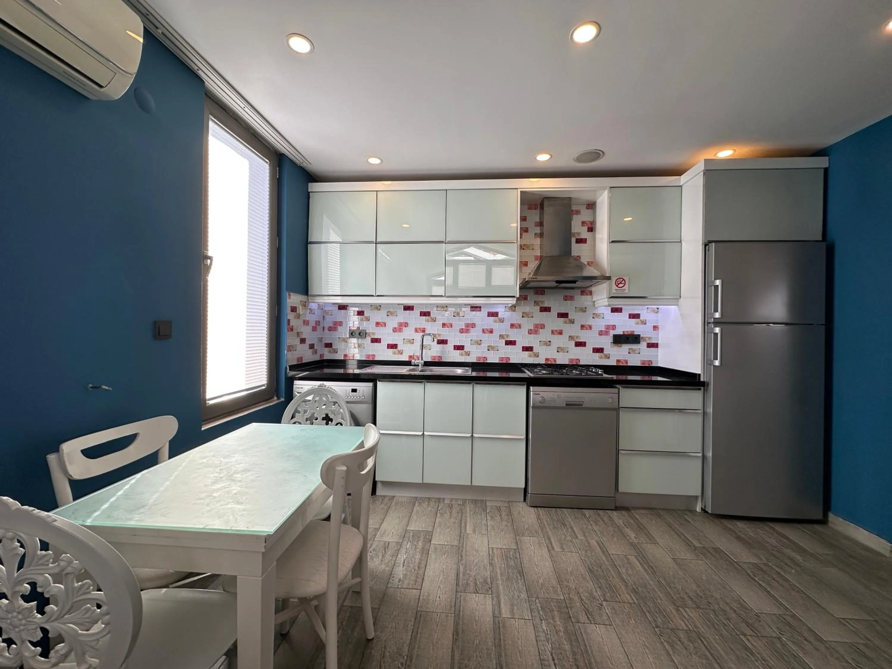 Kitchen or kitchenette in X SUITE APART