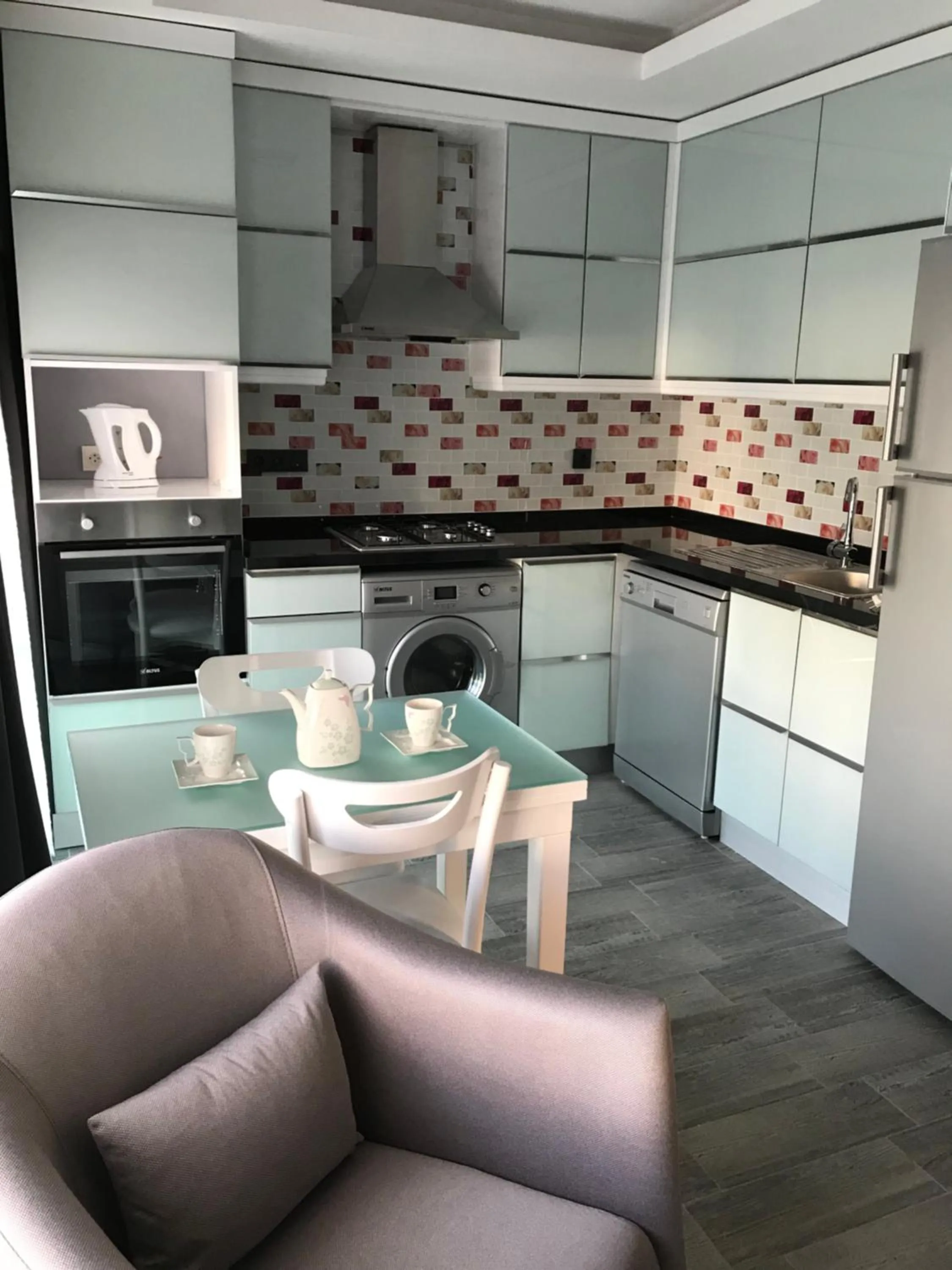 Kitchen or kitchenette in X SUITE APART