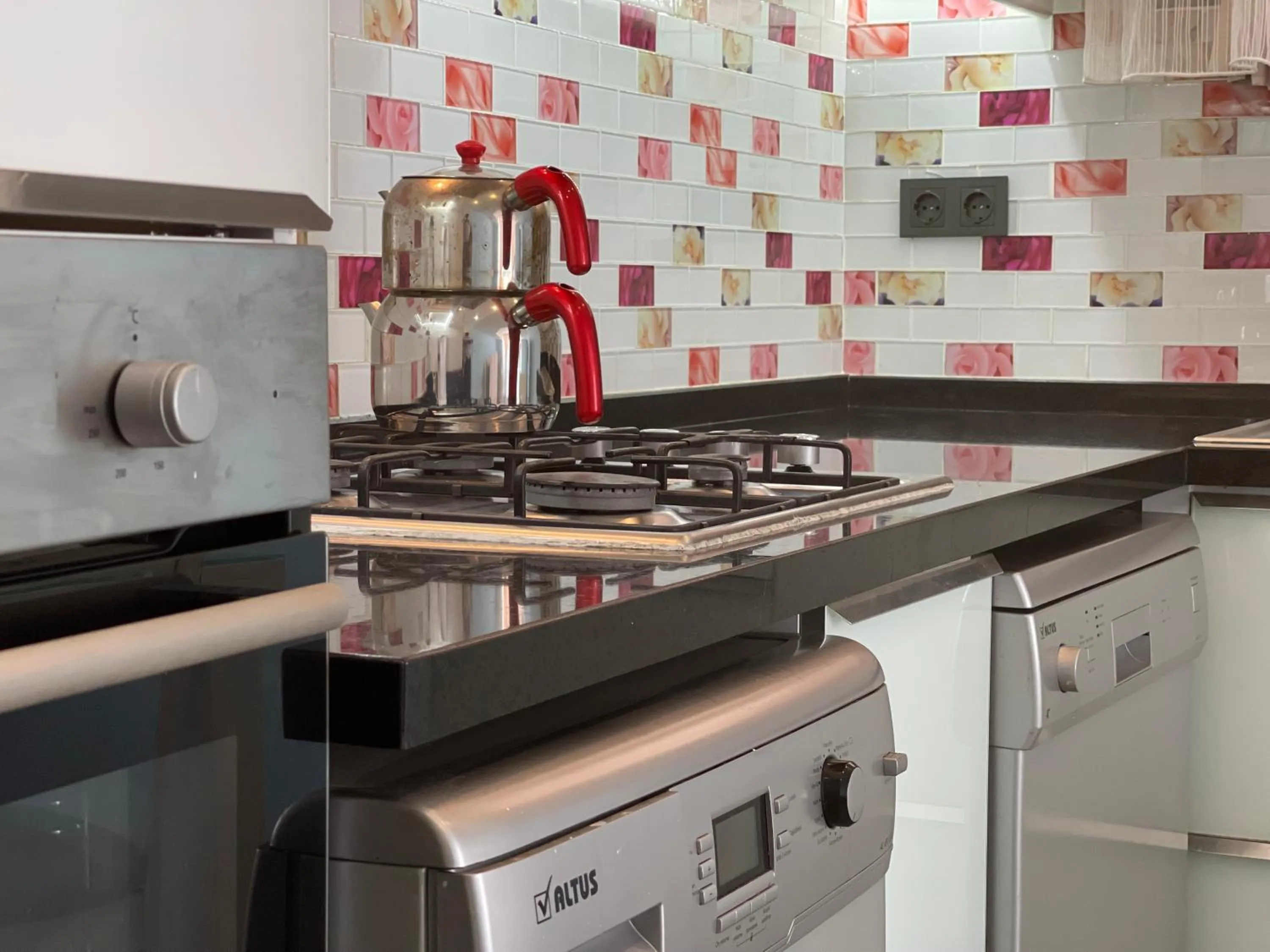 Kitchen or kitchenette in X SUITE APART