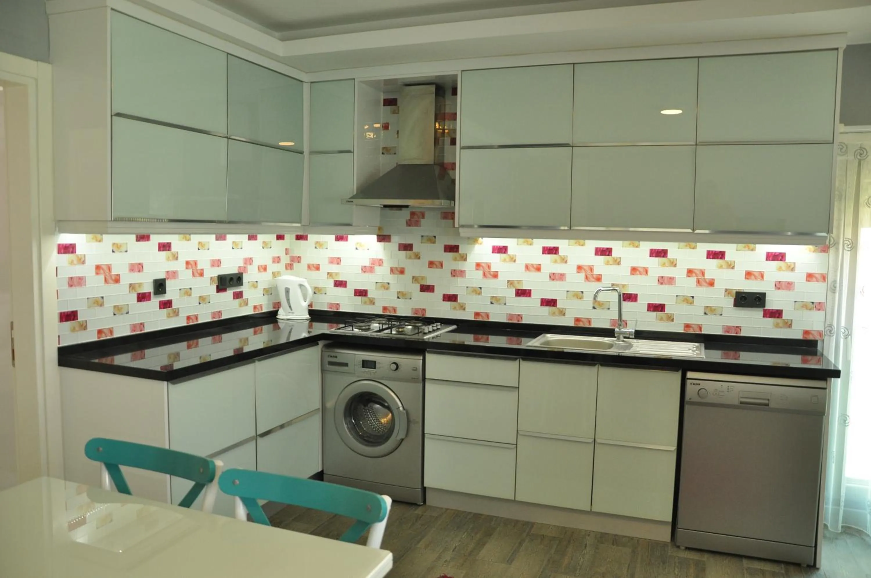 Kitchen or kitchenette in X SUITE APART