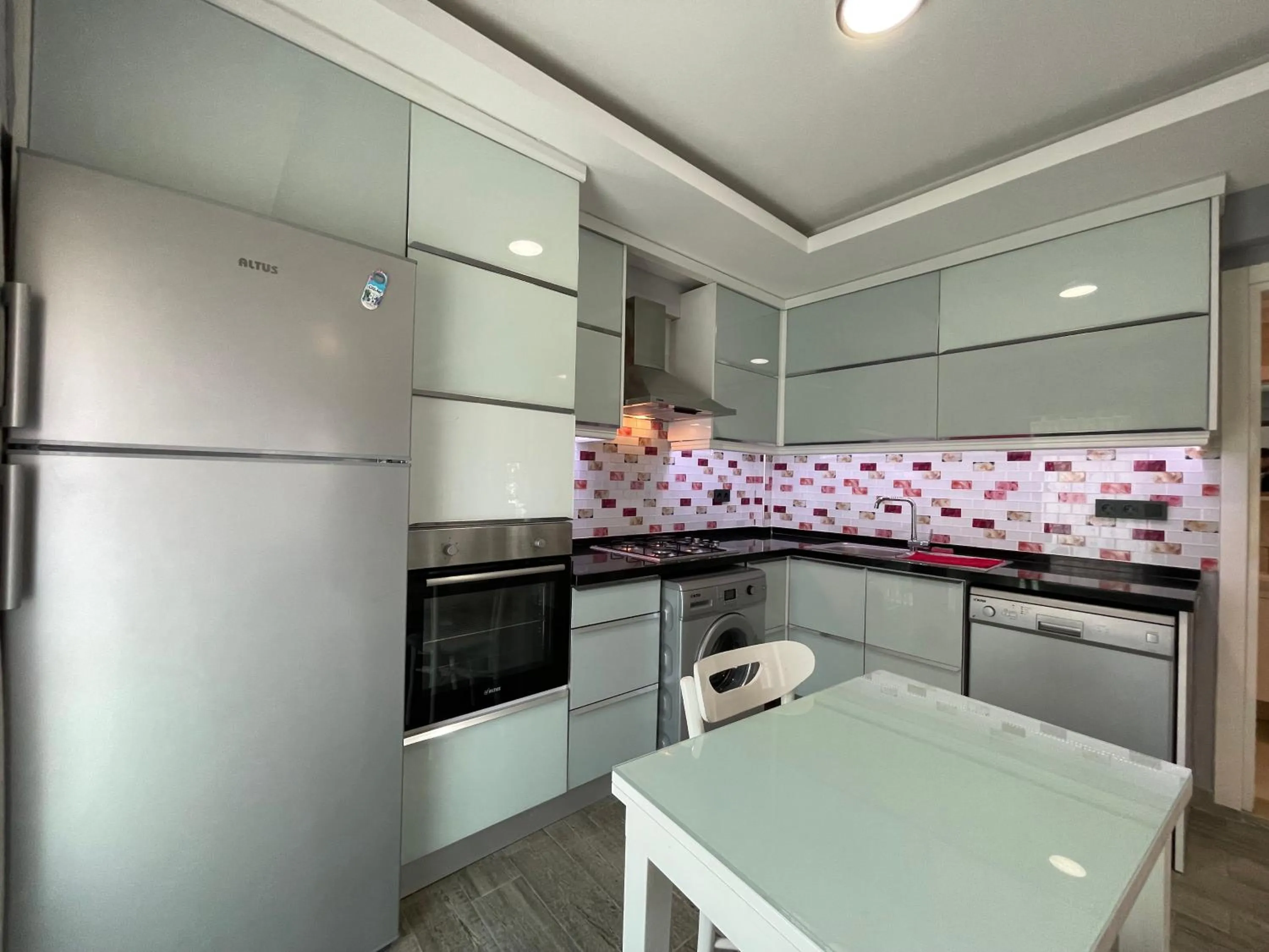 Kitchen or kitchenette in X SUITE APART