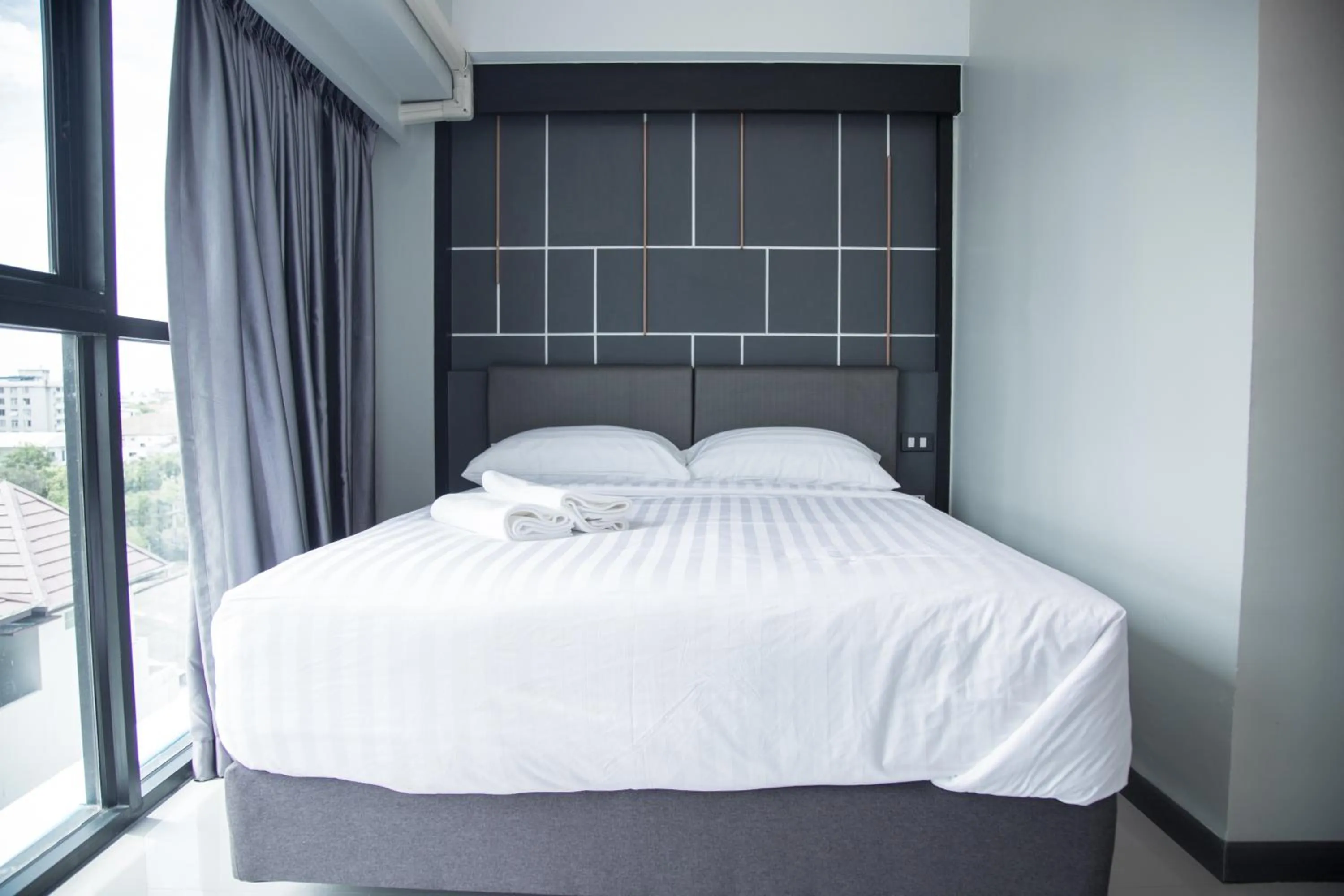 Bed in Hallton Hotel Bangkok