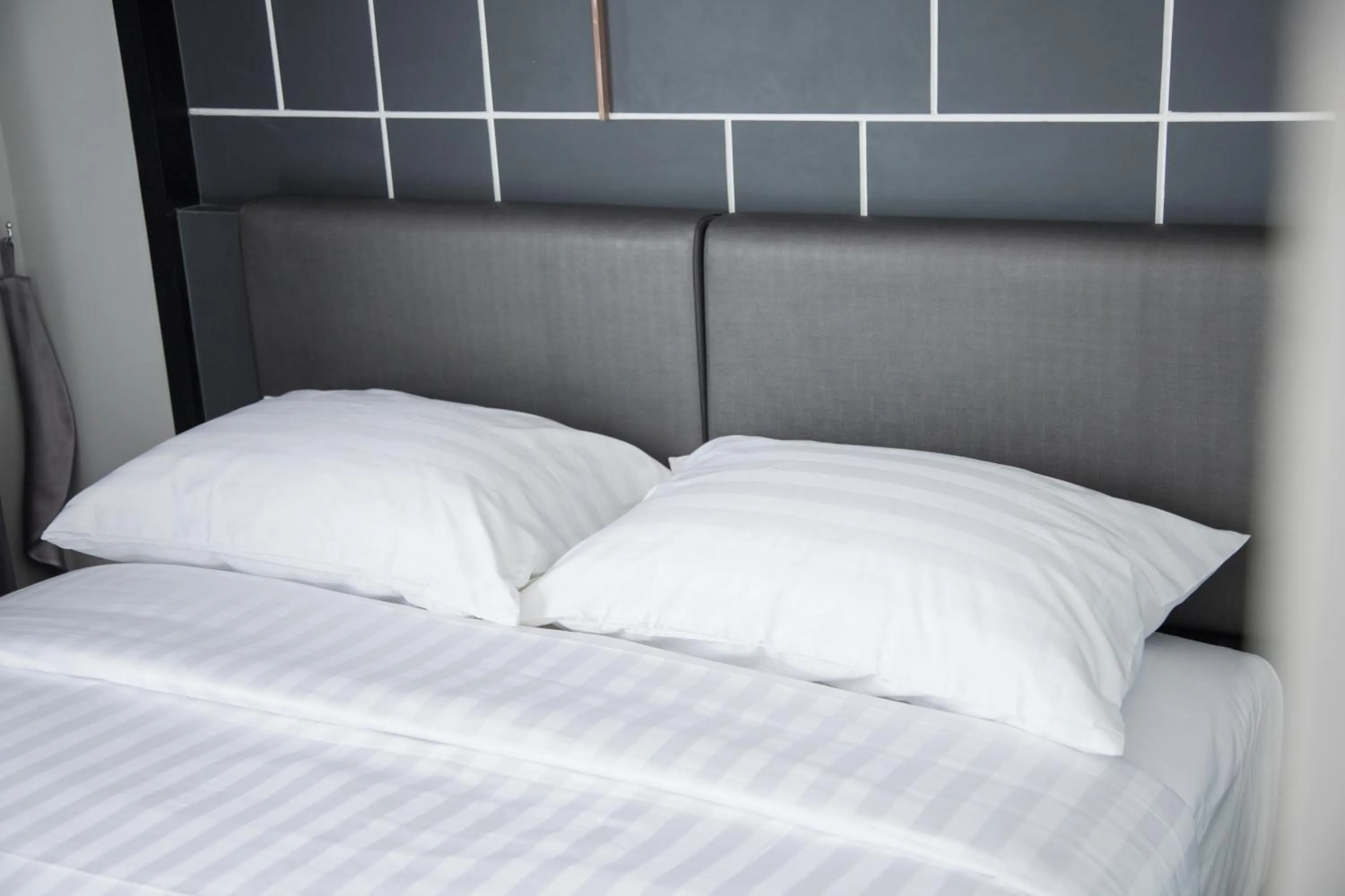 Bed in Hallton Hotel Bangkok