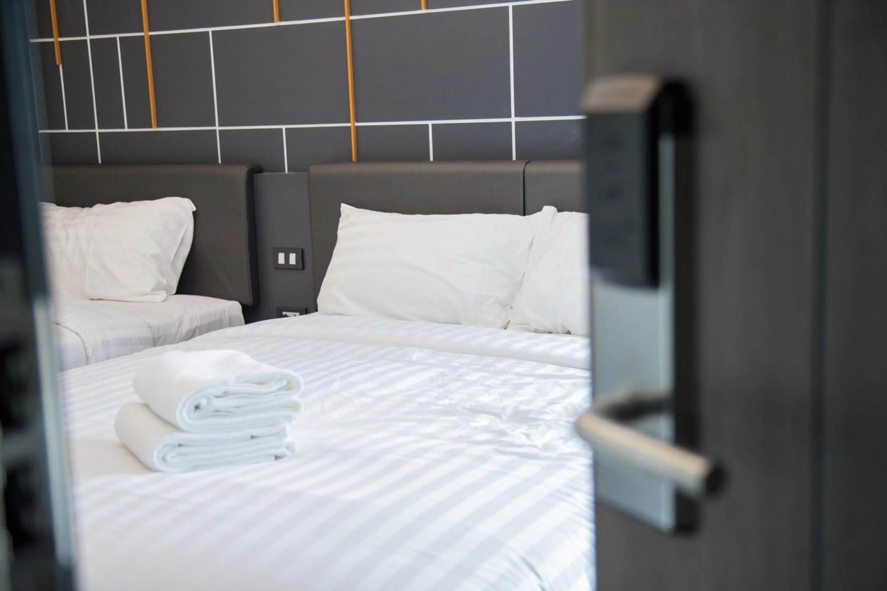 Bed in Hallton Hotel Bangkok