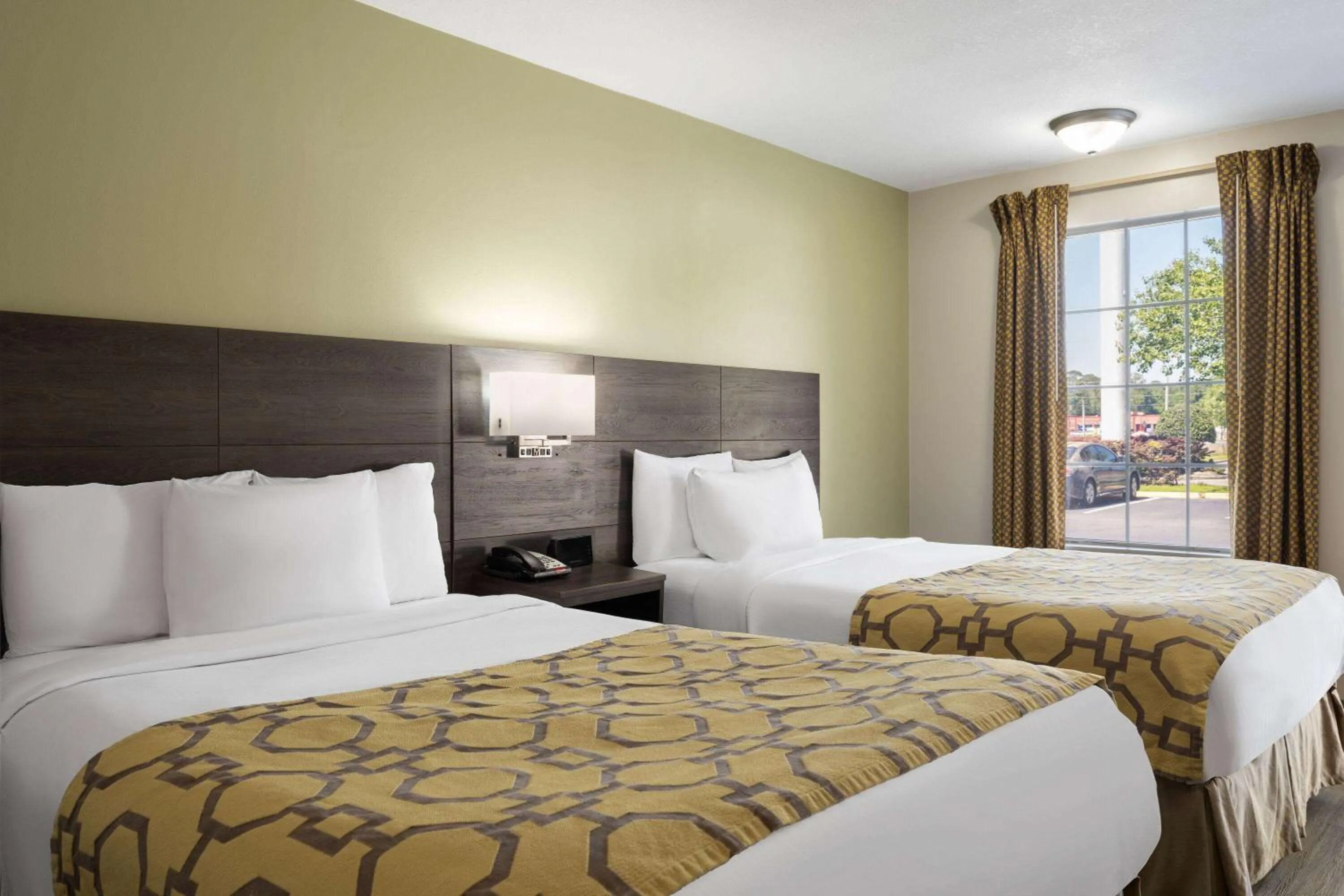 Photo of the whole room, Bed in Baymont by Wyndham Kingsland