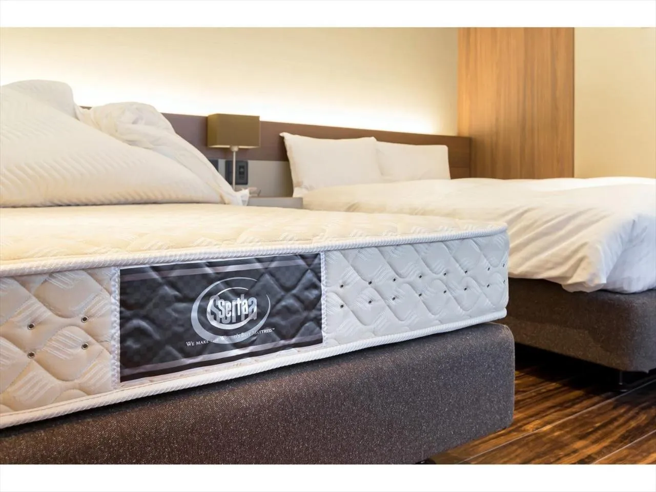 Bed in HOTEL SHINPOIN OSAKA