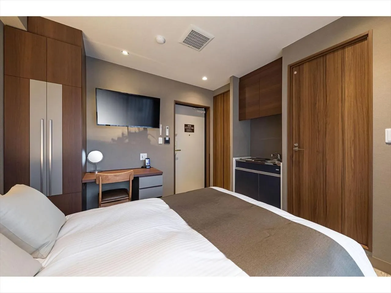 Photo of the whole room, Bed in HOTEL SHINPOIN OSAKA