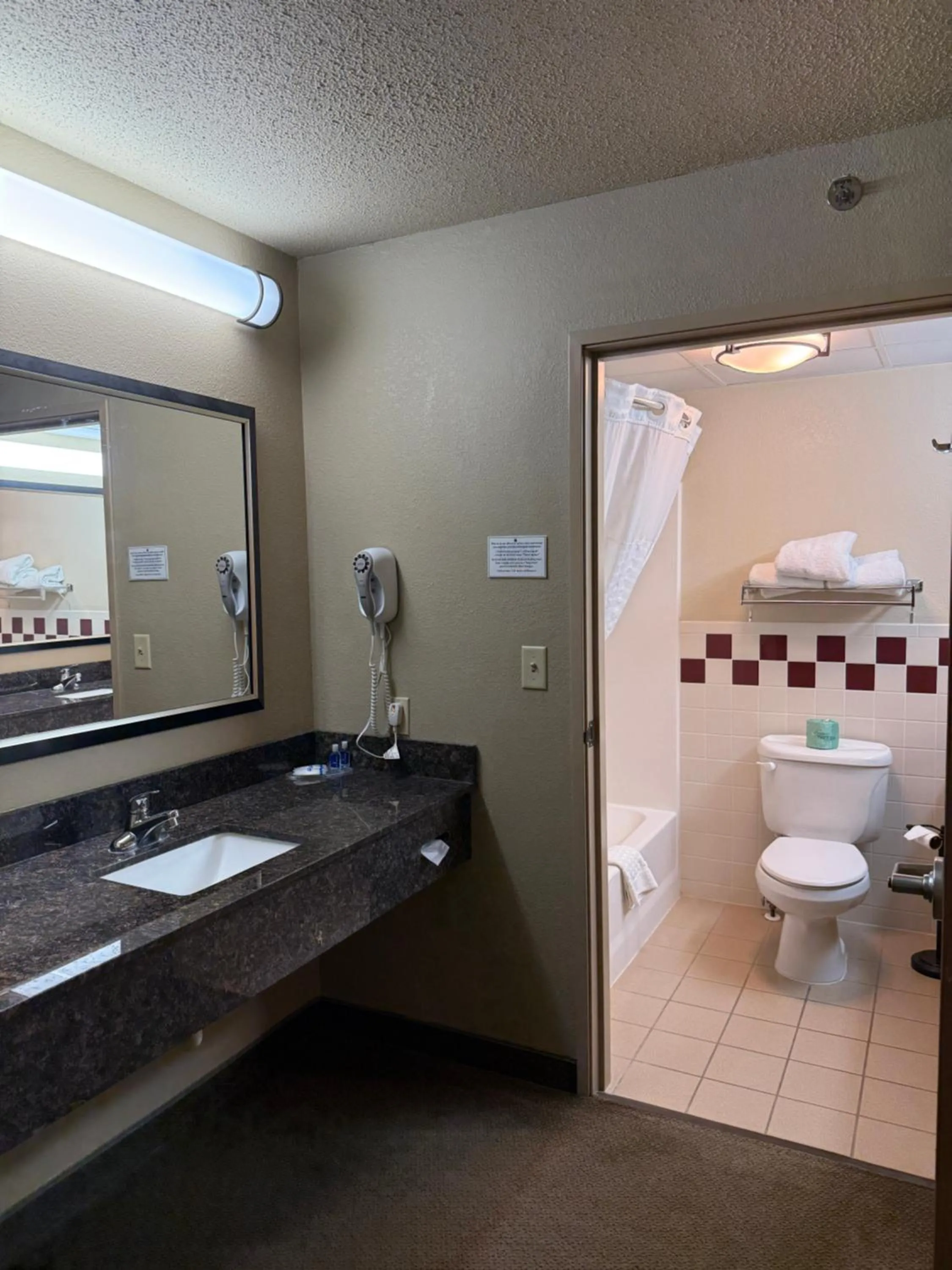 Shower in Rodeway Inn Hesston