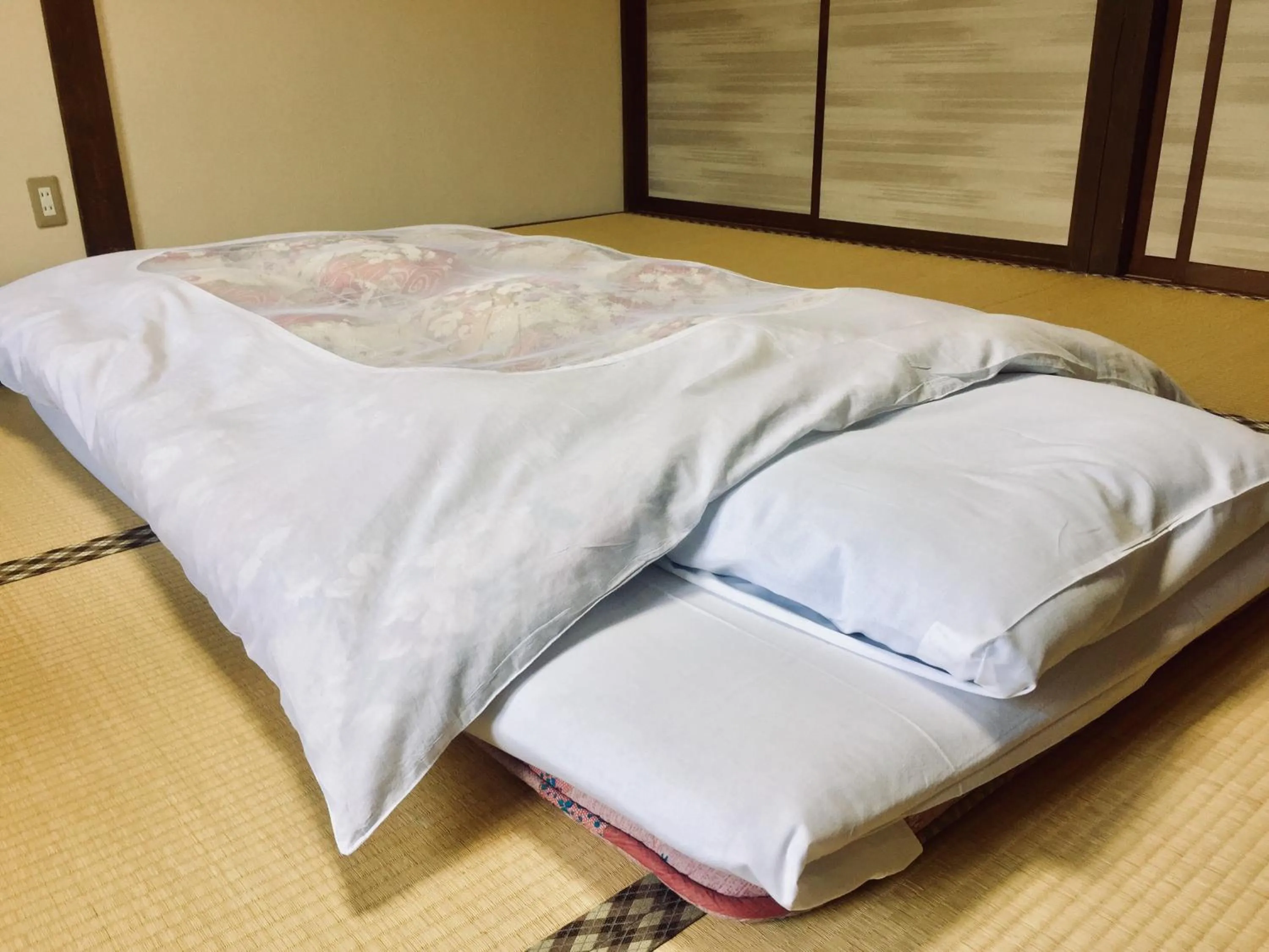 Bed in Bunanoyado Koase