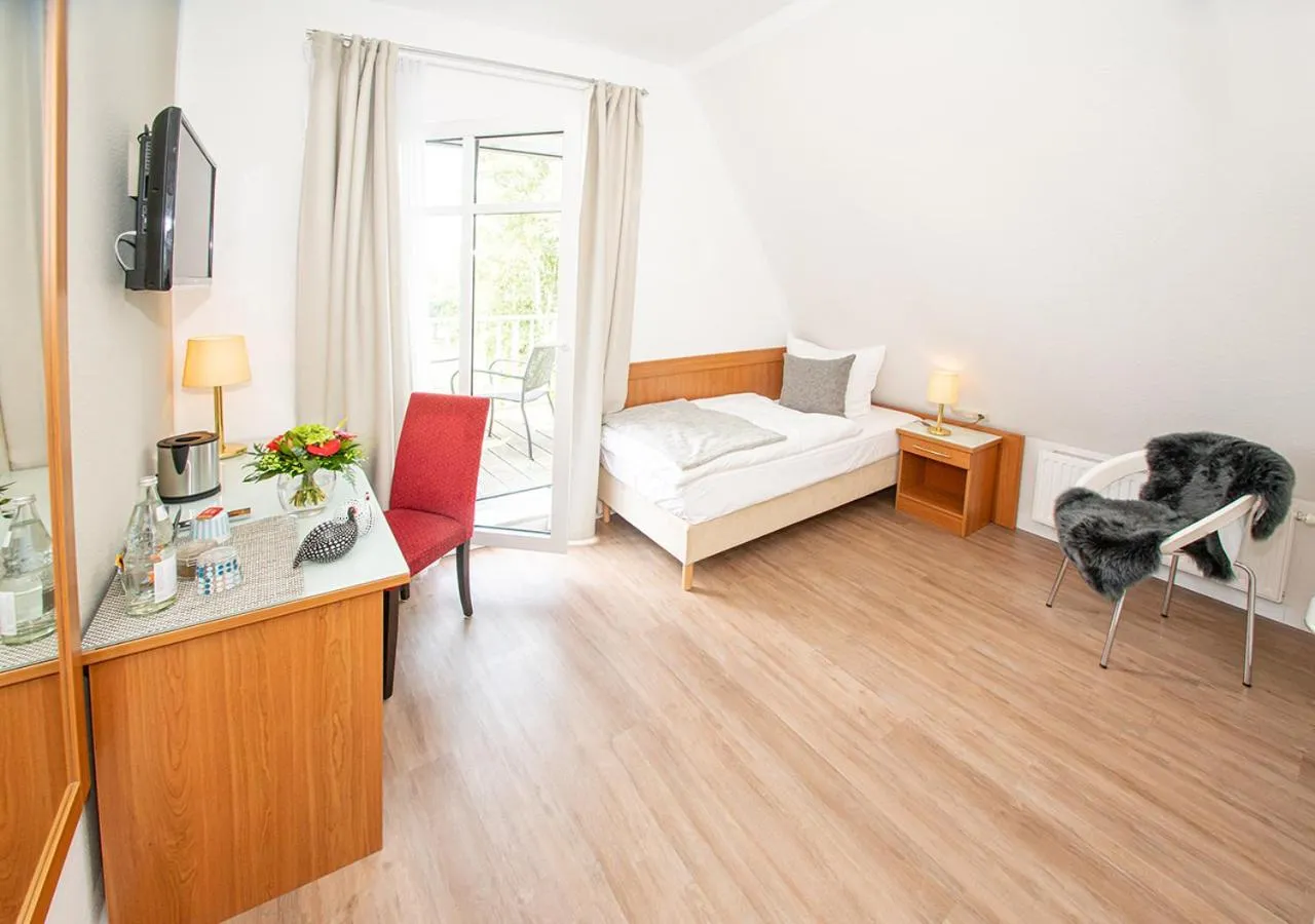 Bed in Gästehaus fliegendes Perlhuhn Borgfeld