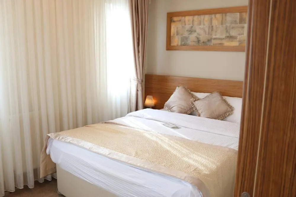 Bed in AKBAK OTEL