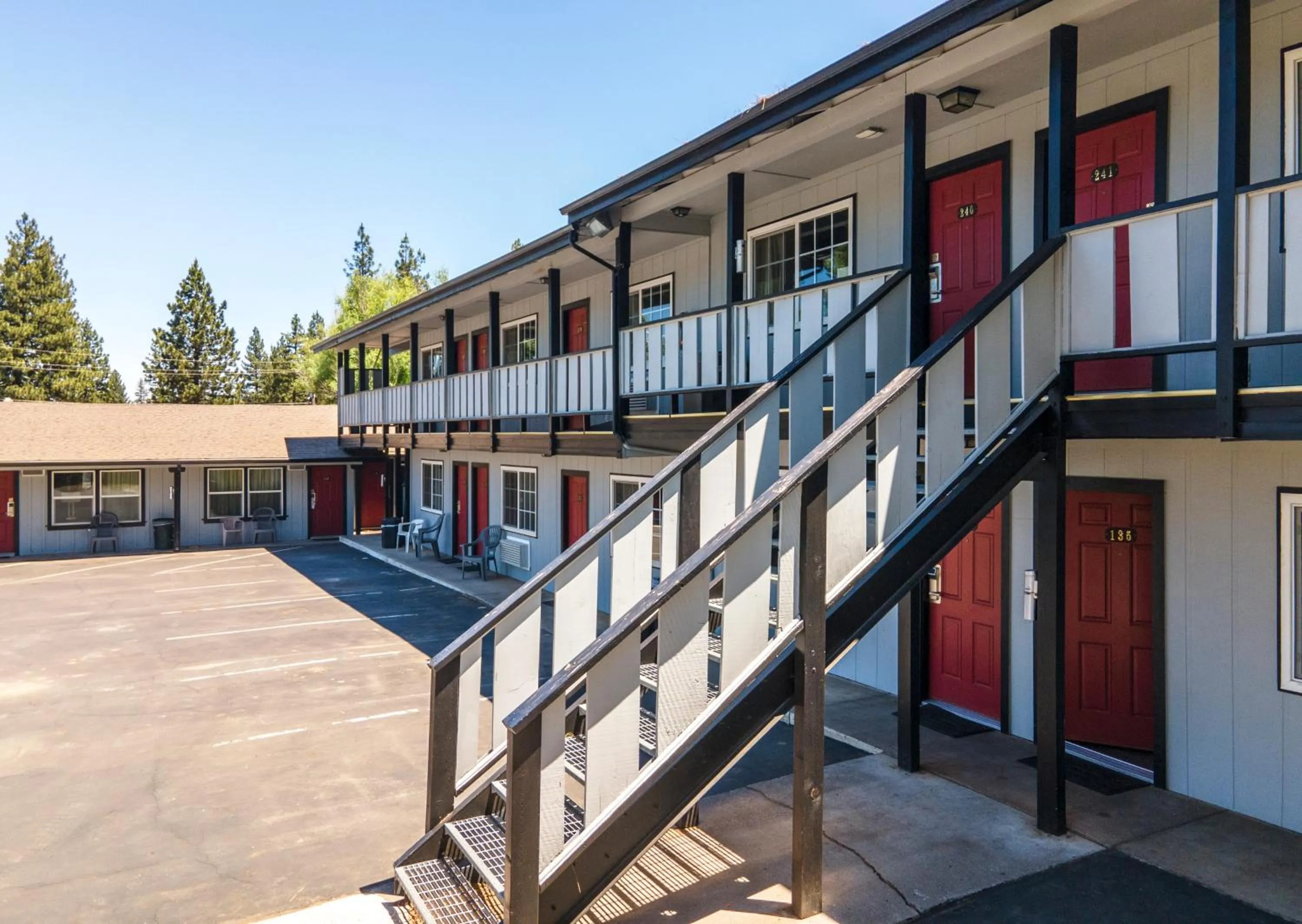 Property building in Charm Motel & Suites