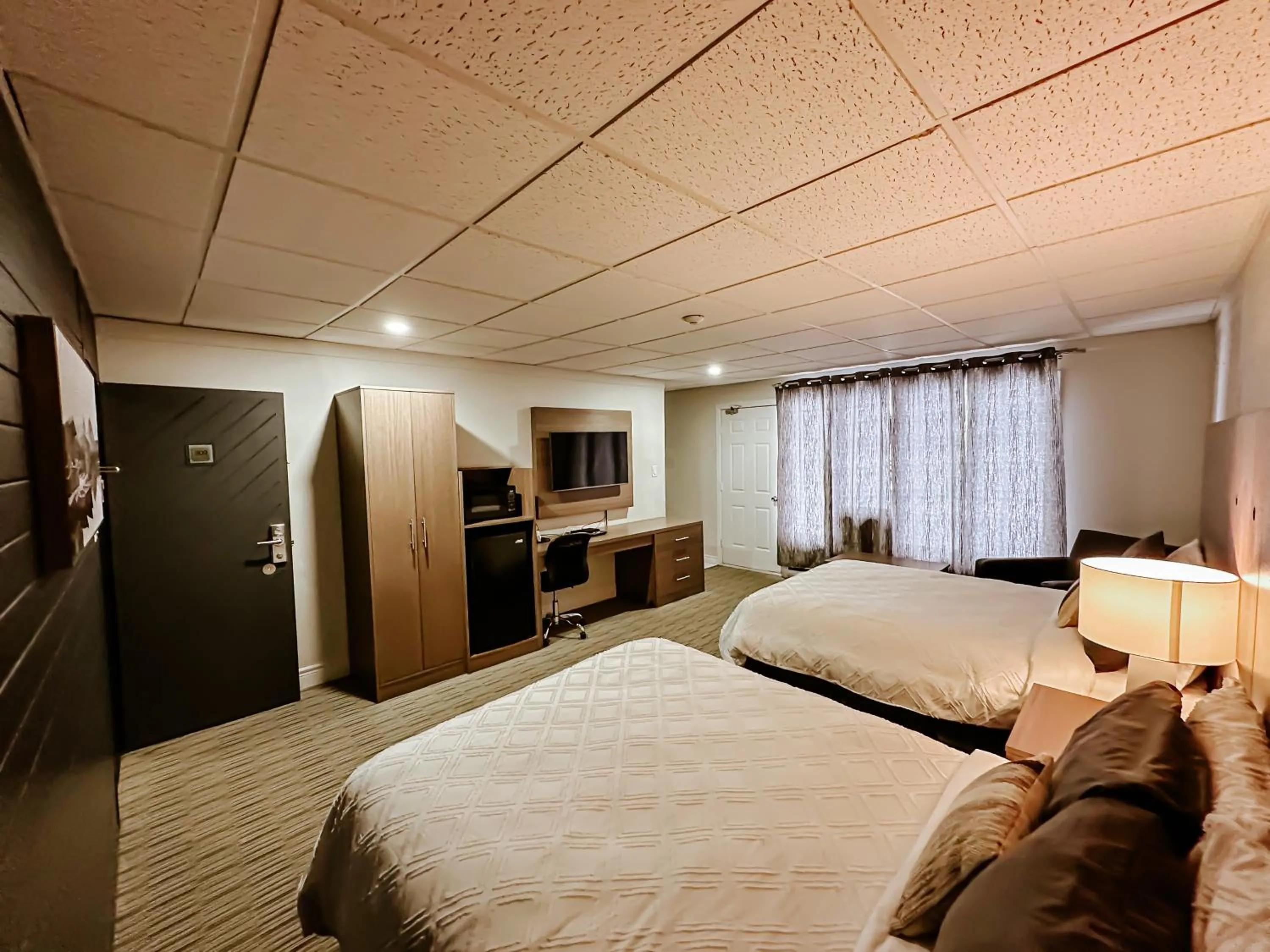 Bed in SureStay by Best Western Kapuskasing