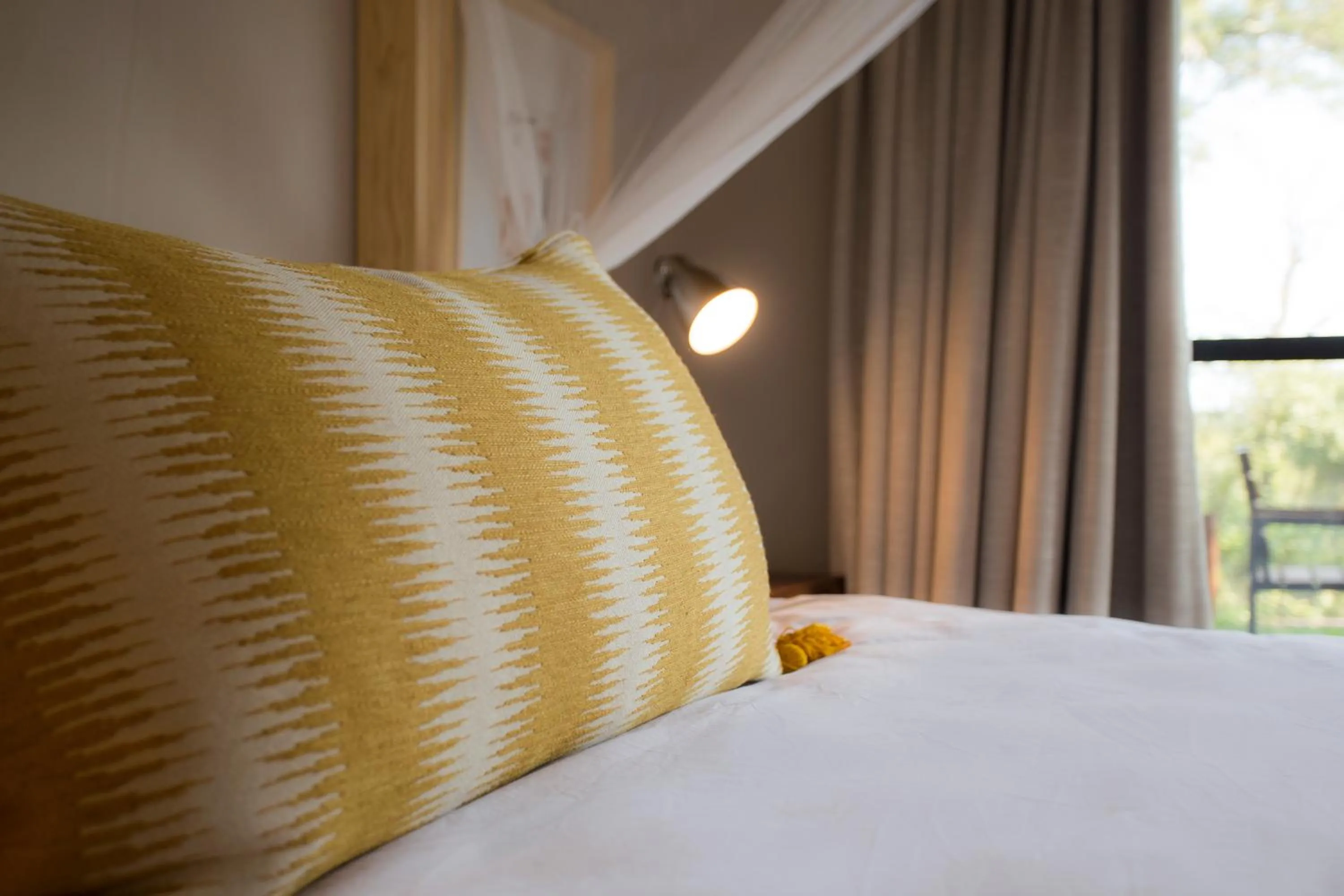 Bed in Moya Safari Villa