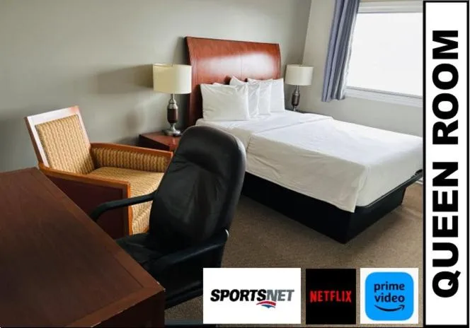 Bed in The Auberge Inn