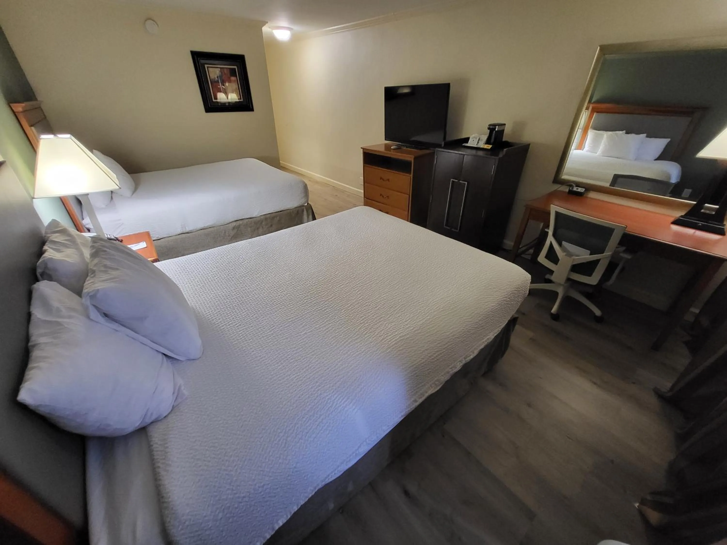 Photo of the whole room, Bed in Ramada by Wyndham Houston Intercontinental Airport East