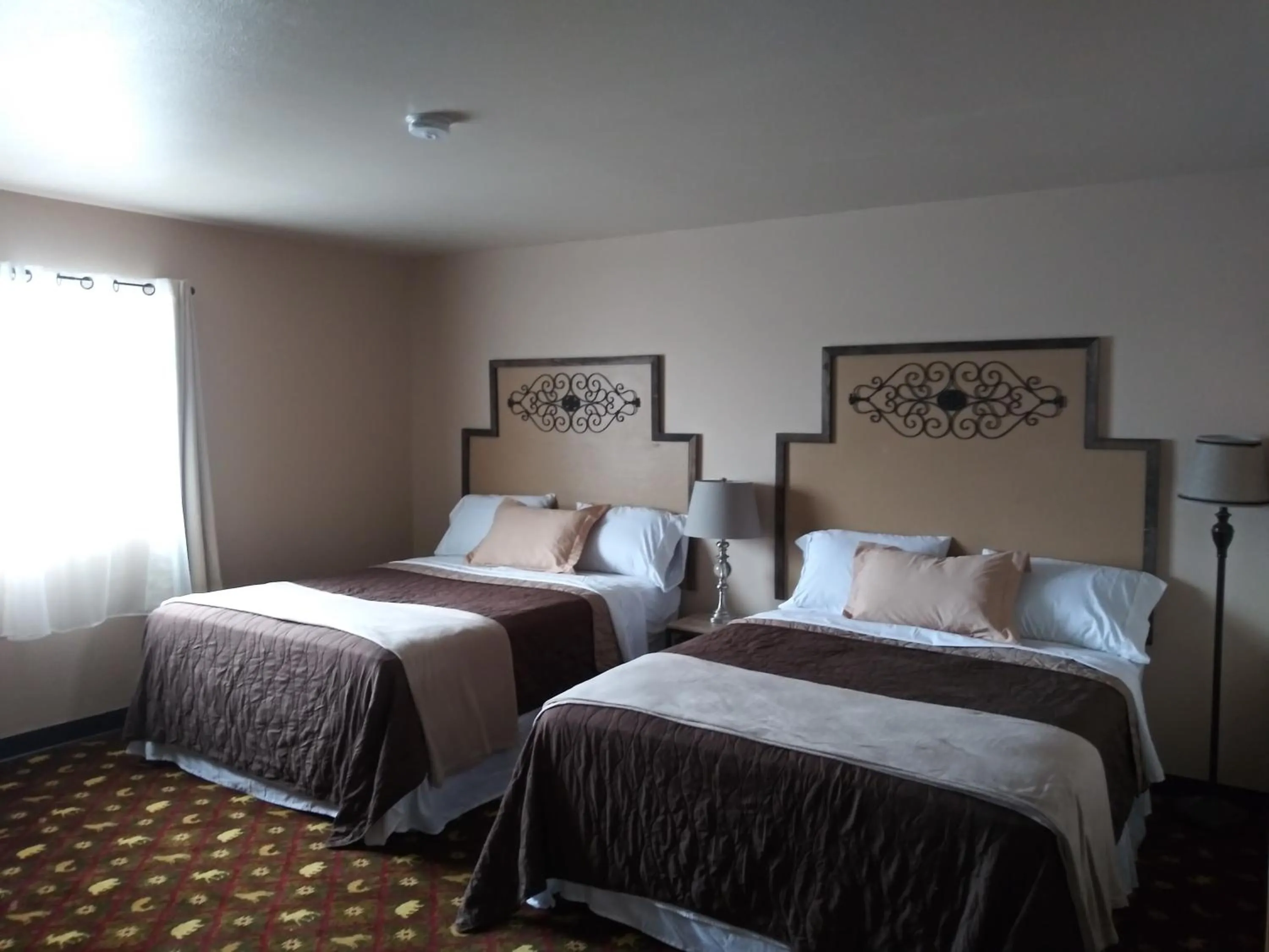 Bed in Alaska Angler's Inn