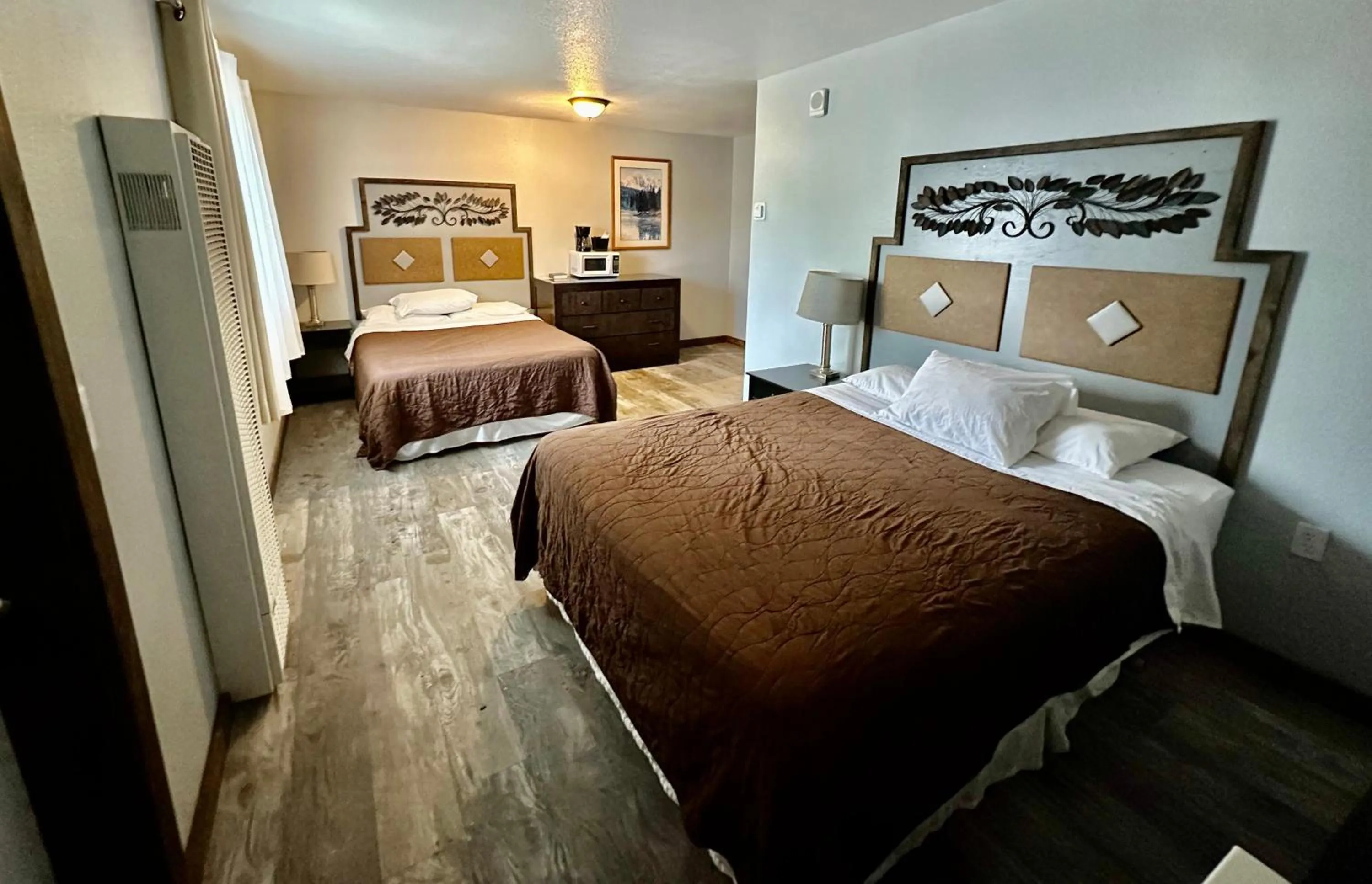 Bed in Alaska Angler's Inn