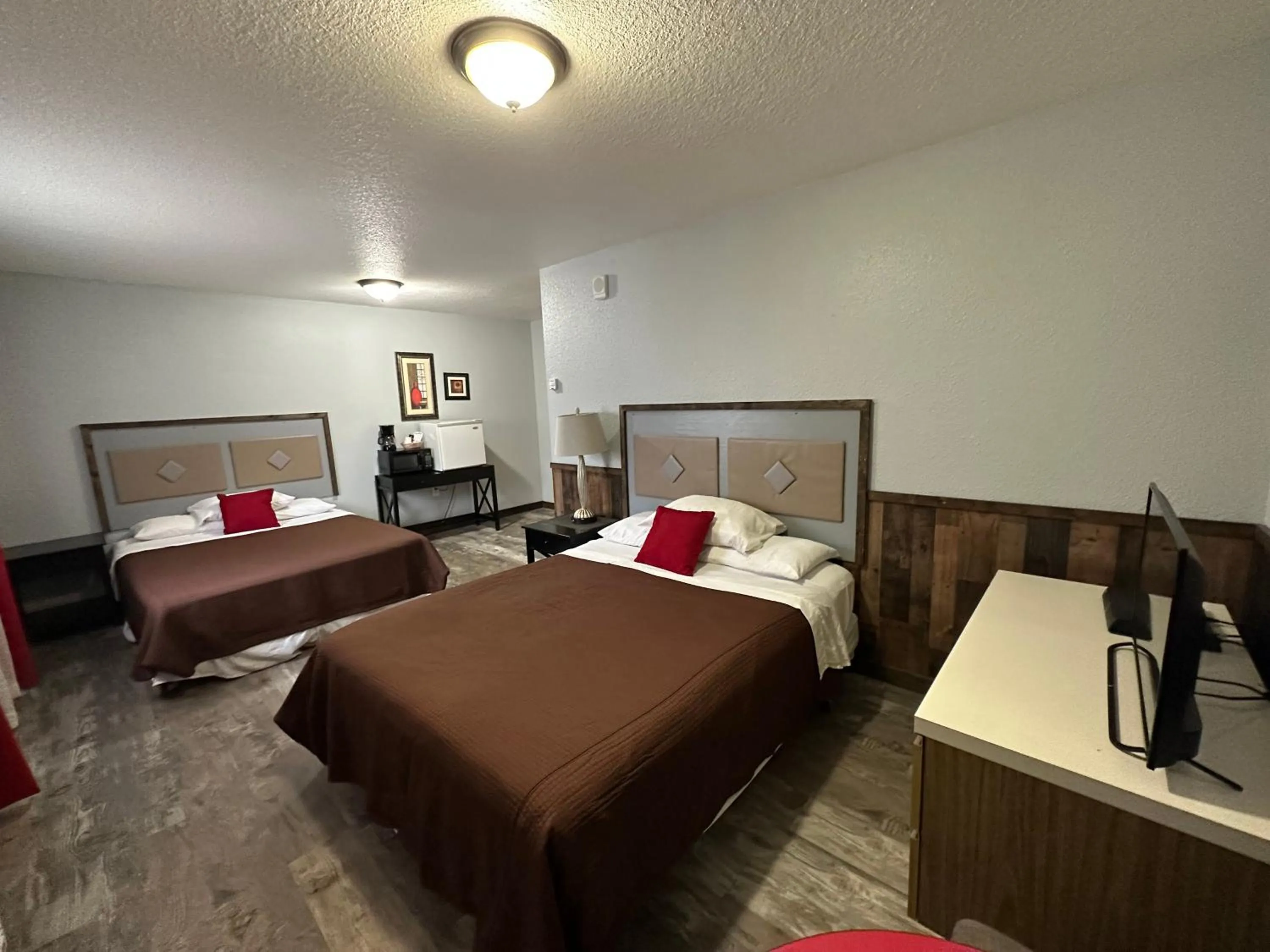 Bed in Alaska Angler's Inn