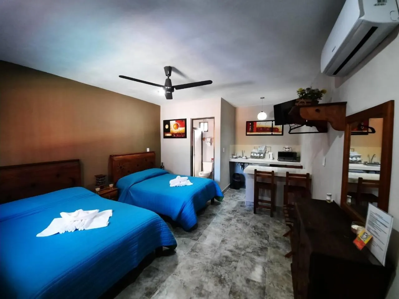 Photo of the whole room, Bed in Holbox Isla Bonita
