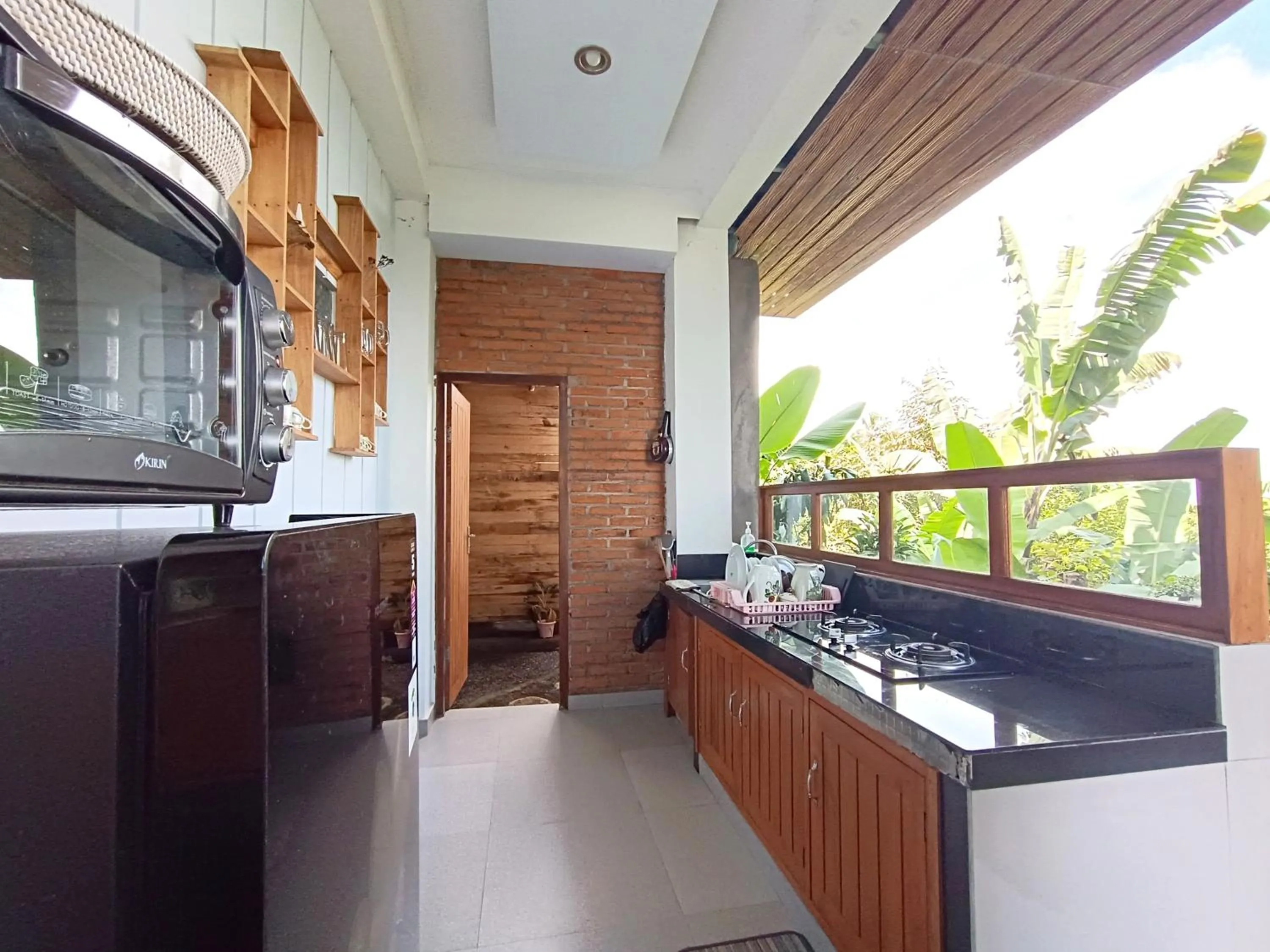 Kitchen or kitchenette in La Montaña Bali & Spa