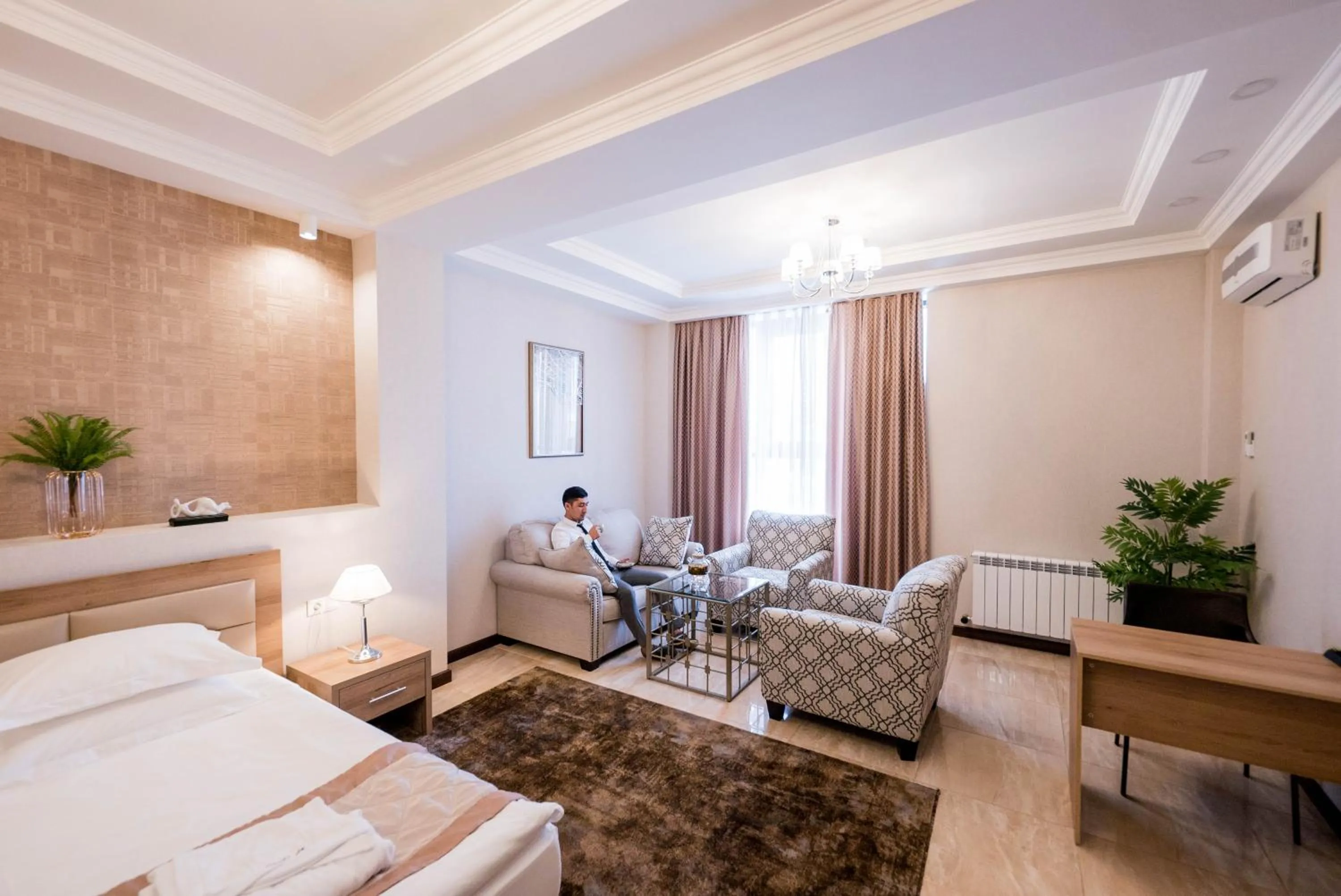 Living room, Bed in Oasis Residence