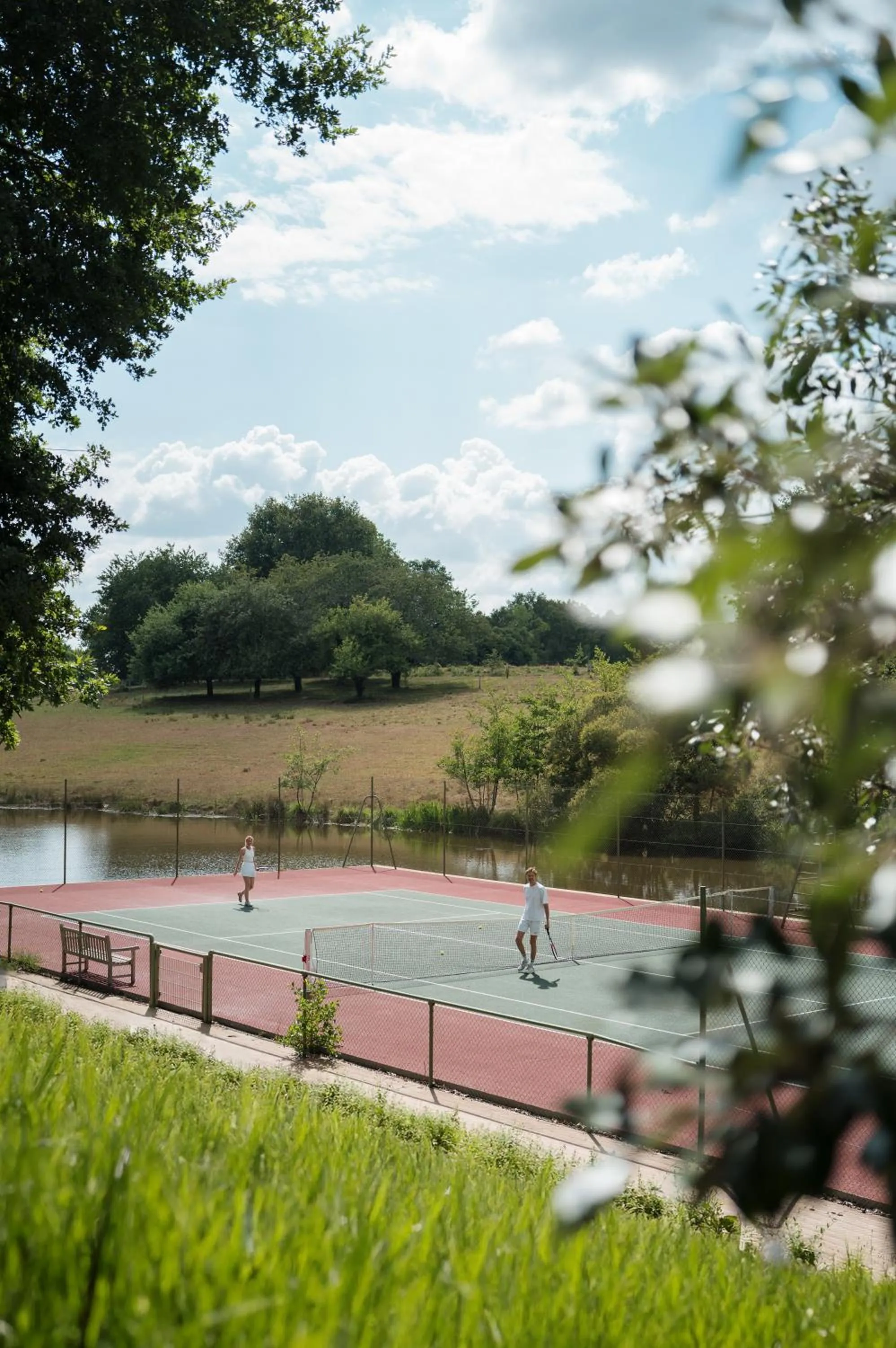 Tennis court in Domaine des Etangs, Auberge Collection