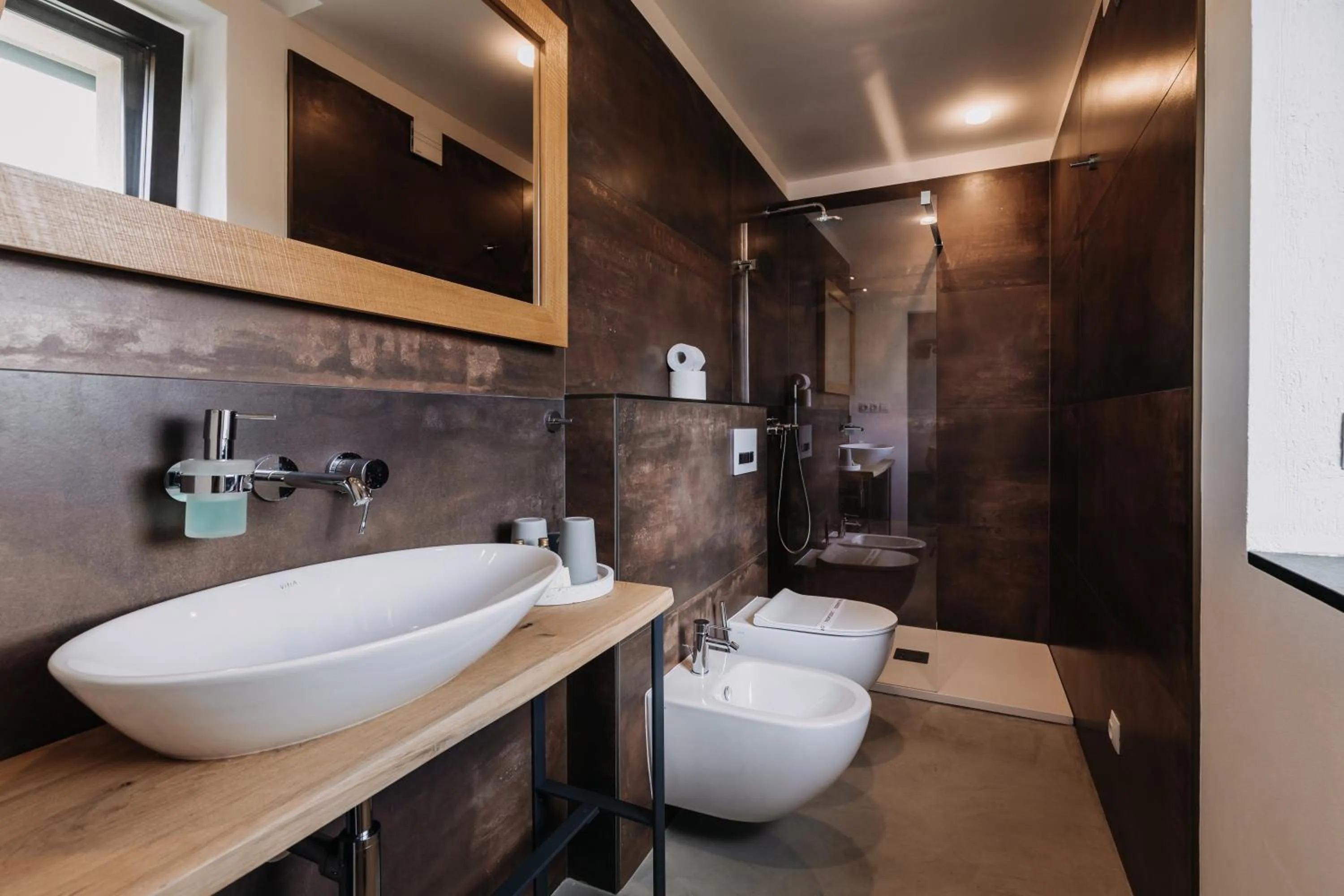 Bathroom in VILLA BRICOLA - Boutique Apartments