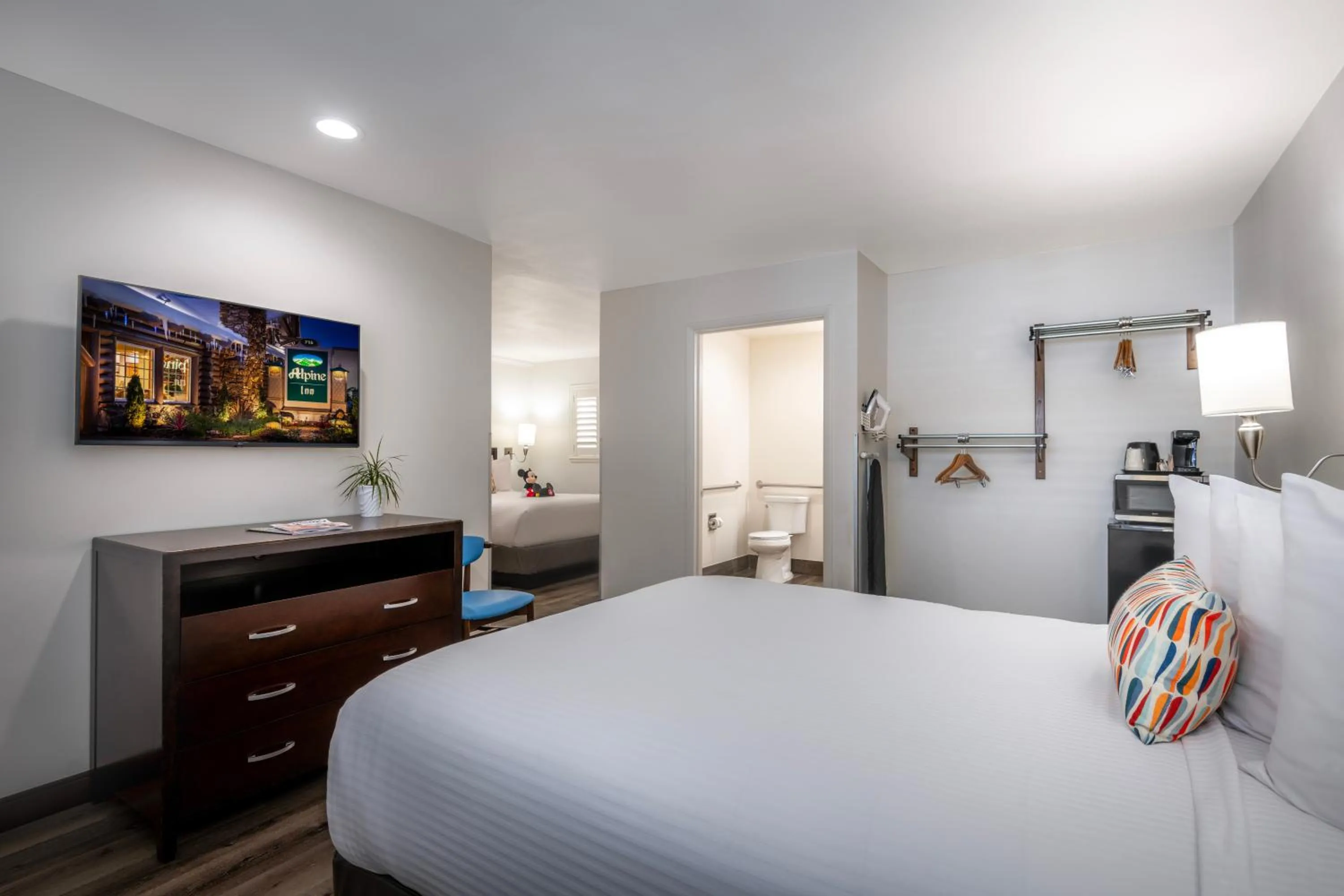 Photo of the whole room, Bed in Alpine Inn near Convention Center and the Park