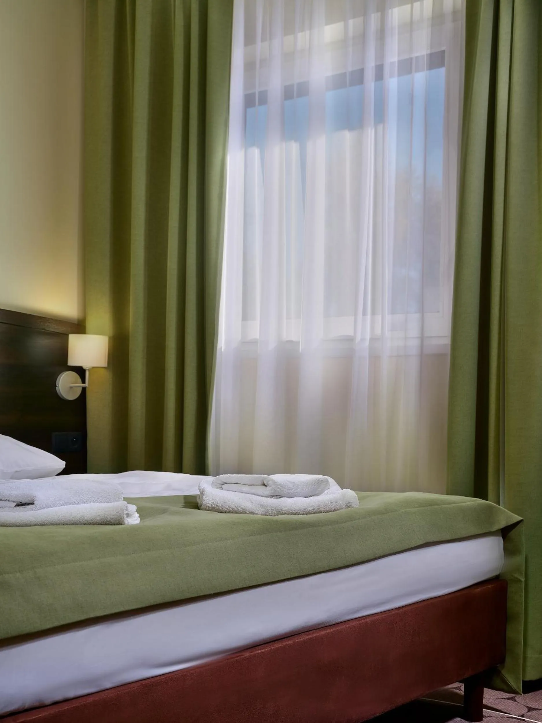 Bed in Aparthotel Lumen