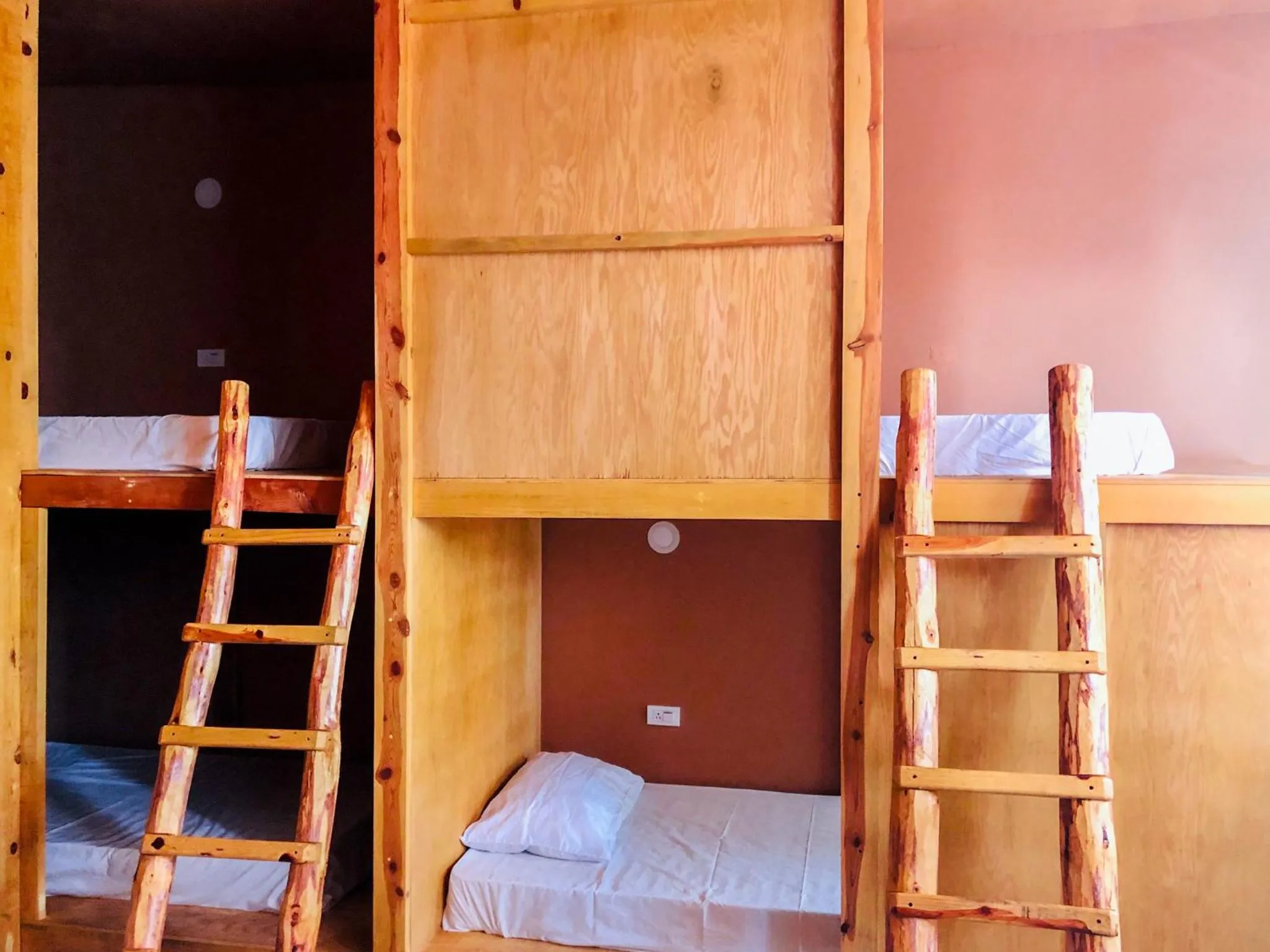 Bed in Hostal Kuira Bá by Rotamundos