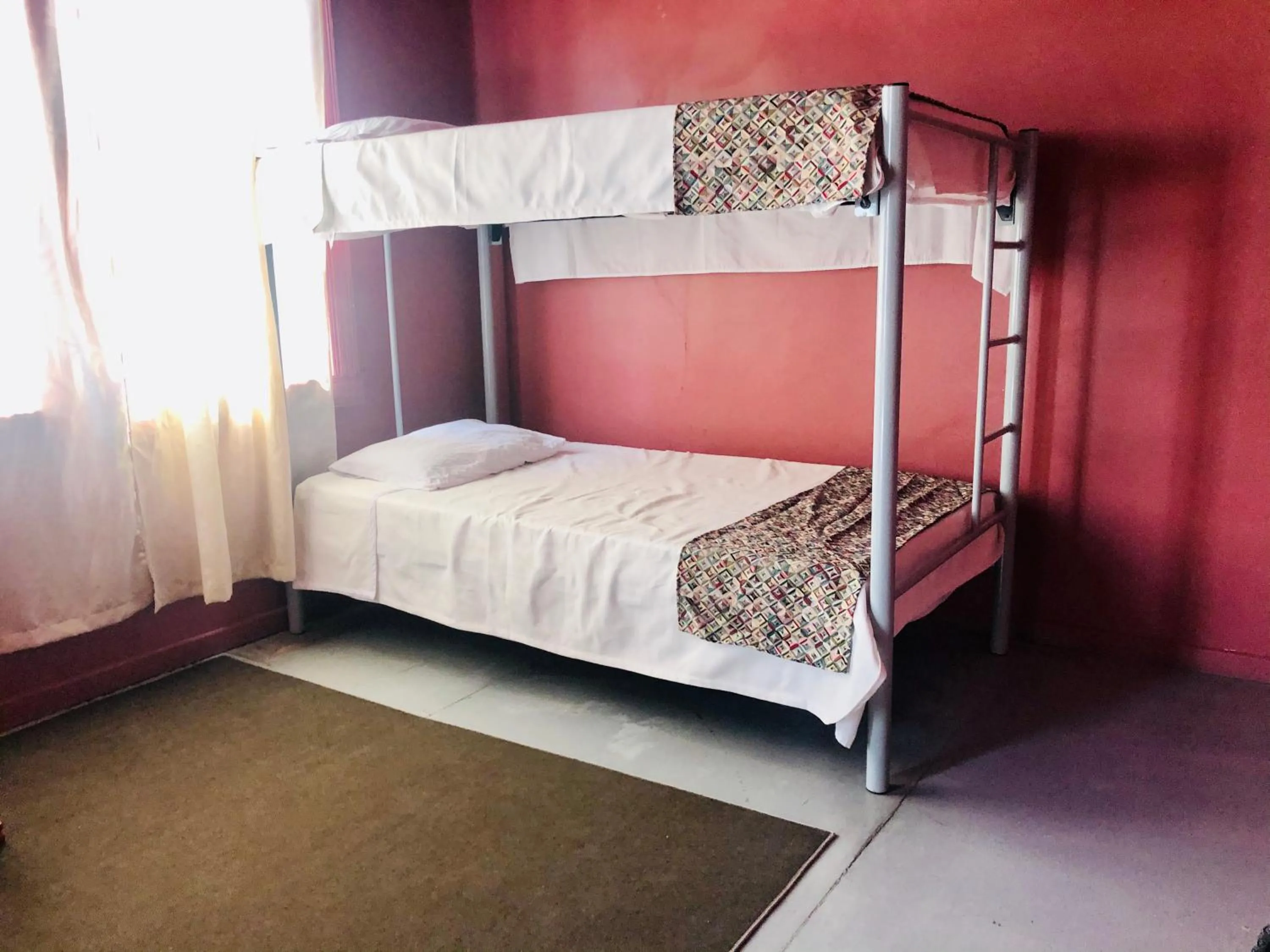 bunk bed in Hostal Kuira Bá by Rotamundos