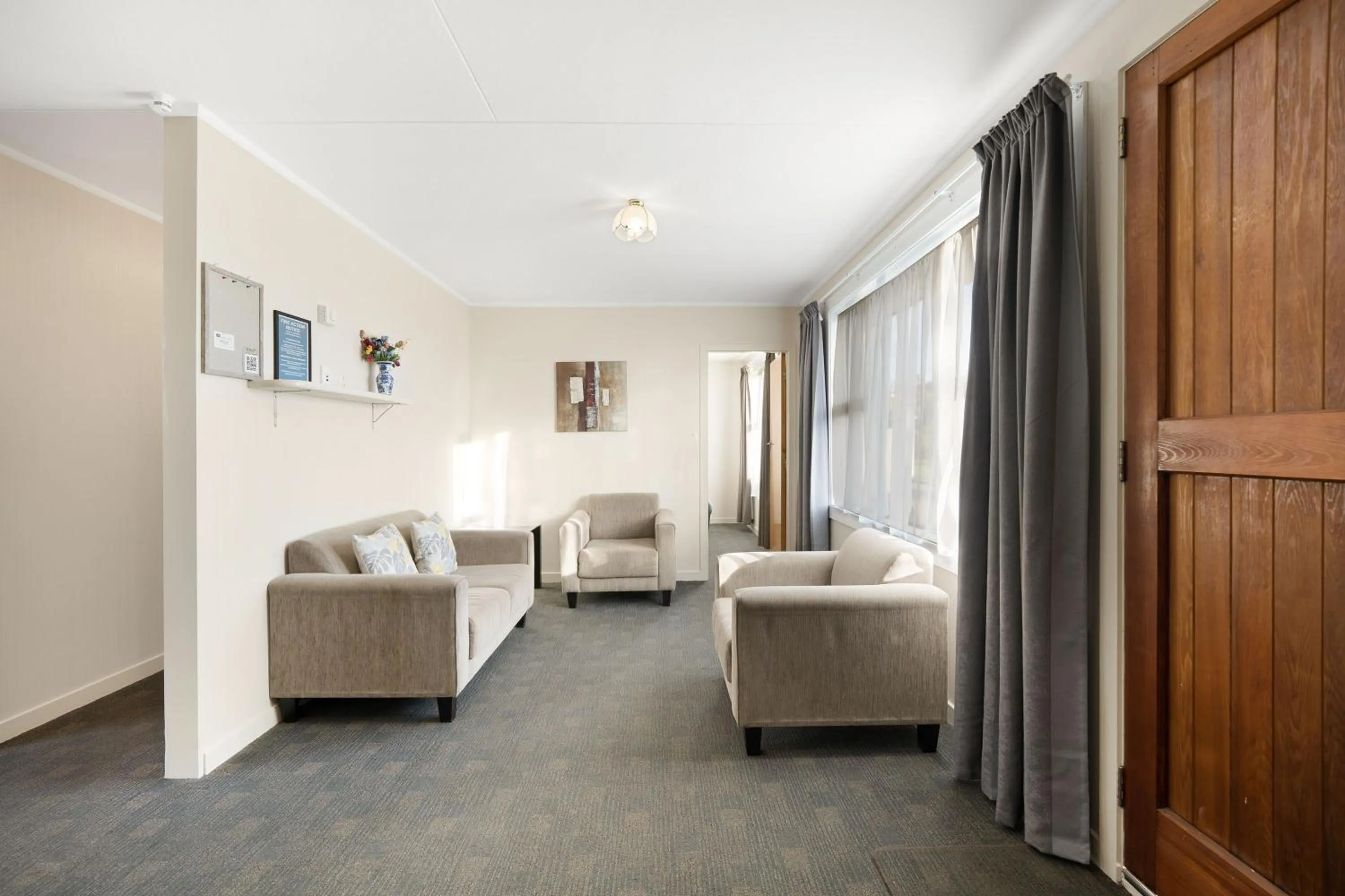 Seating area in ASURE Oakleigh Motel