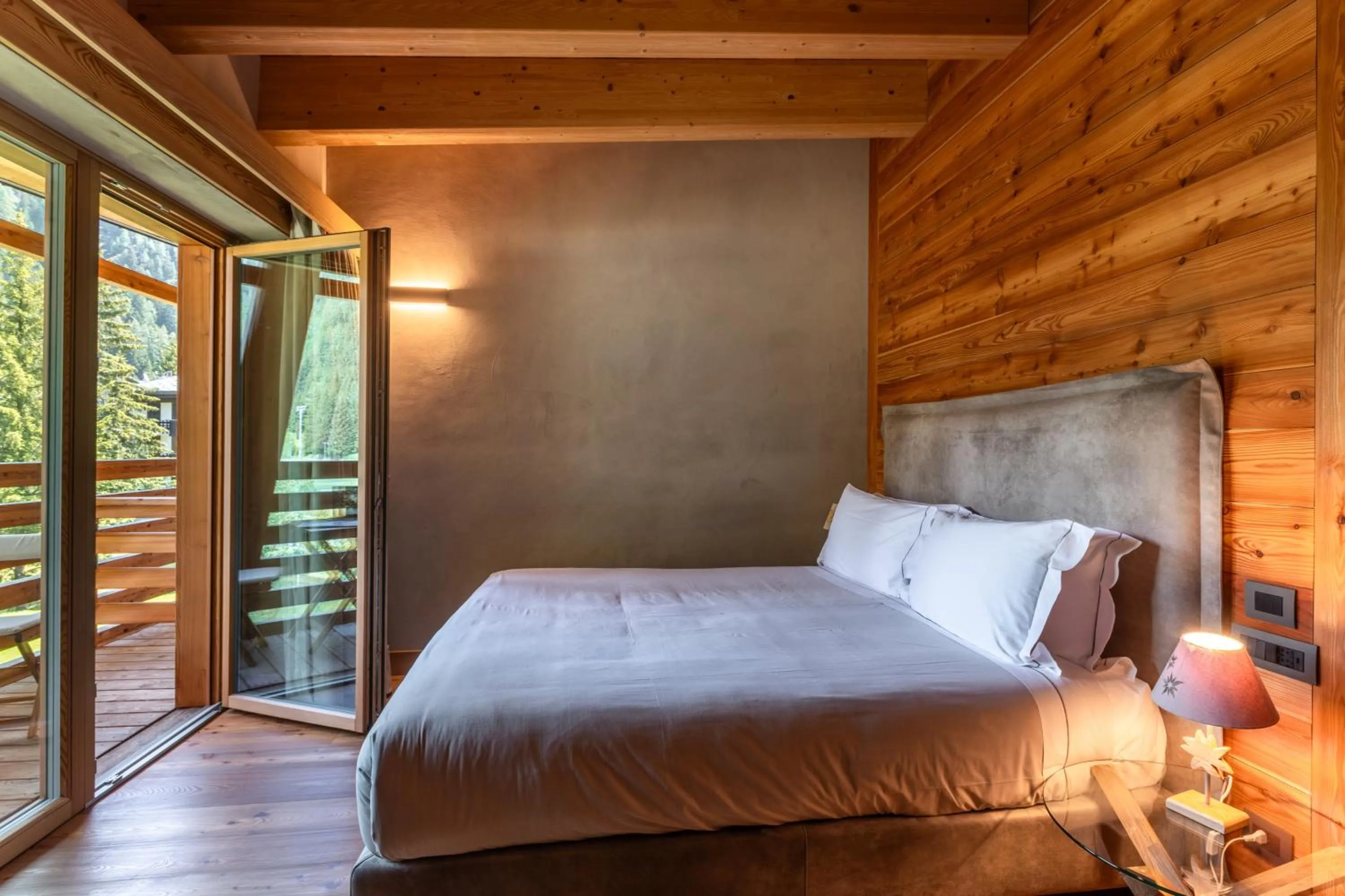 Bed in Au Charmant Petit Lac - Ecohotel Parc & Spa