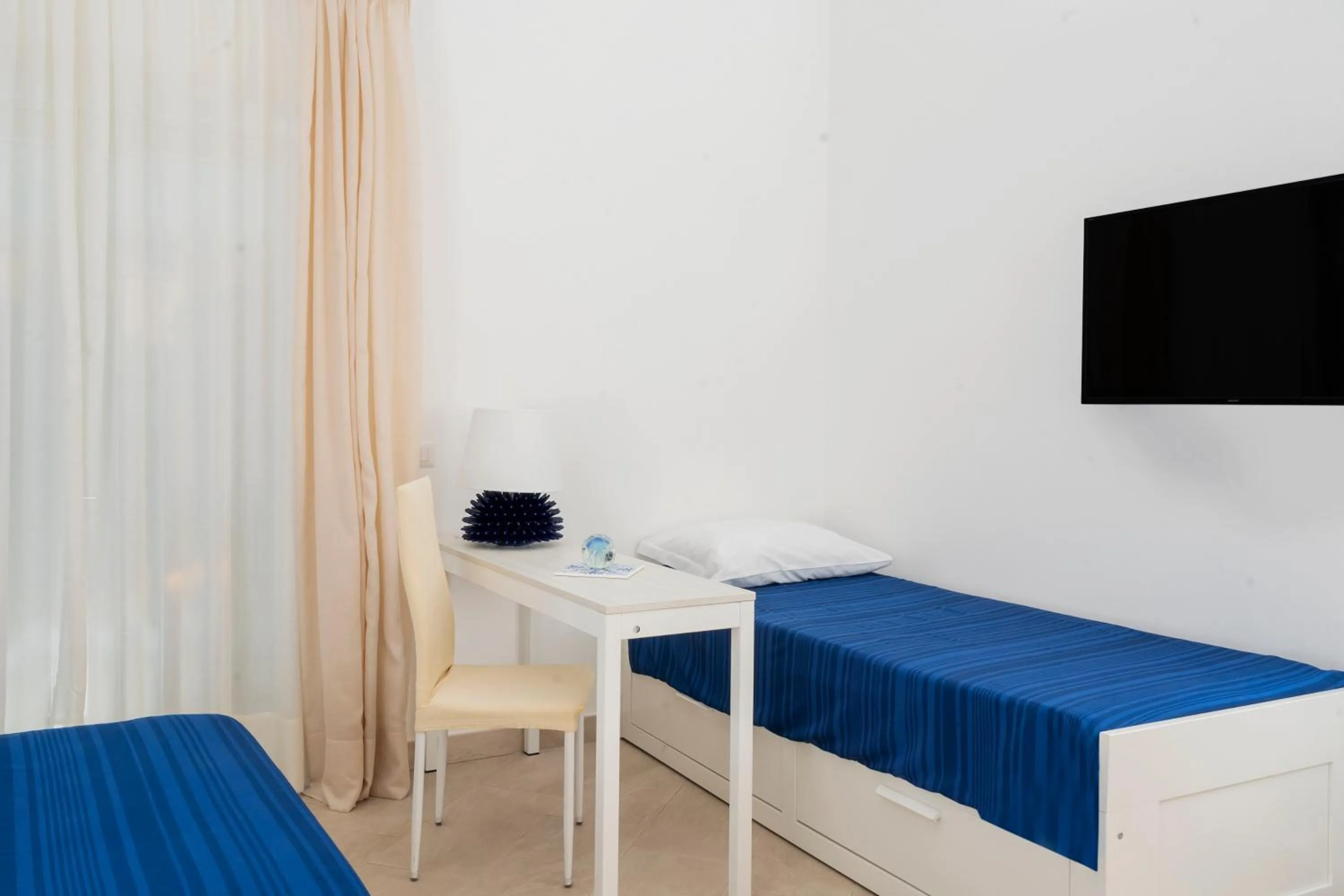 Bed in Caprita Guest House