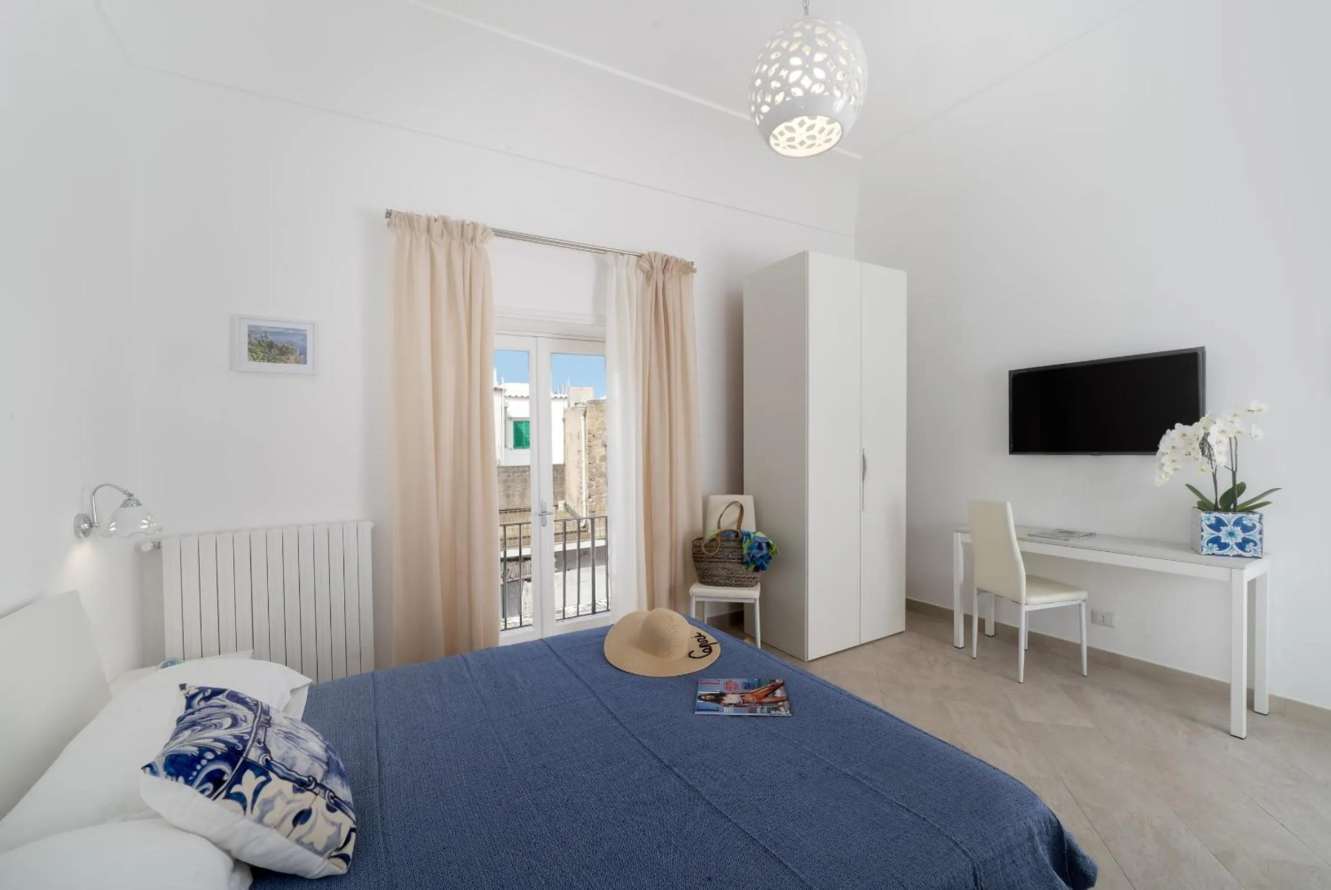 Bed in Caprita Guest House