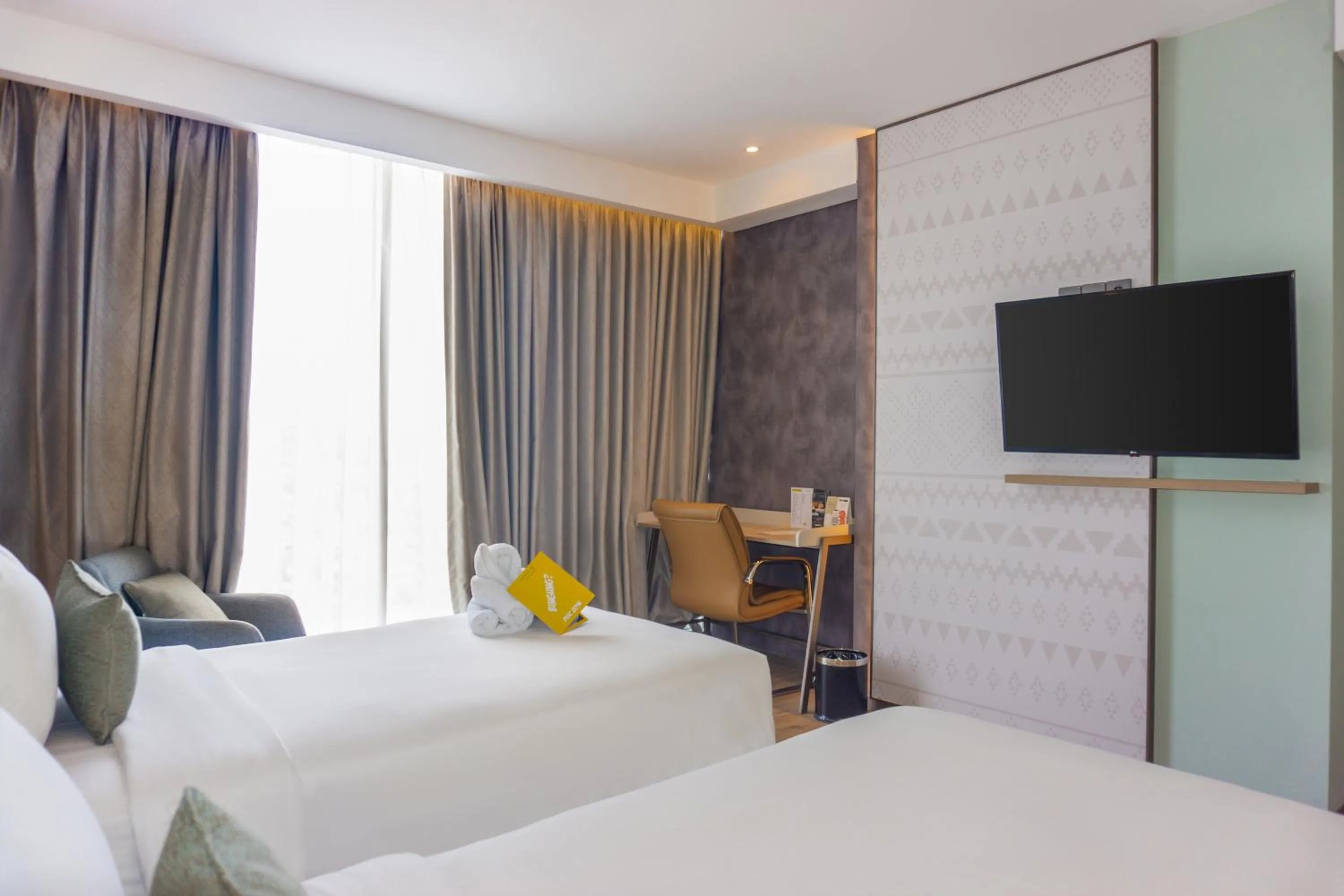 Bed in Golden Tulip Springhill Lampung