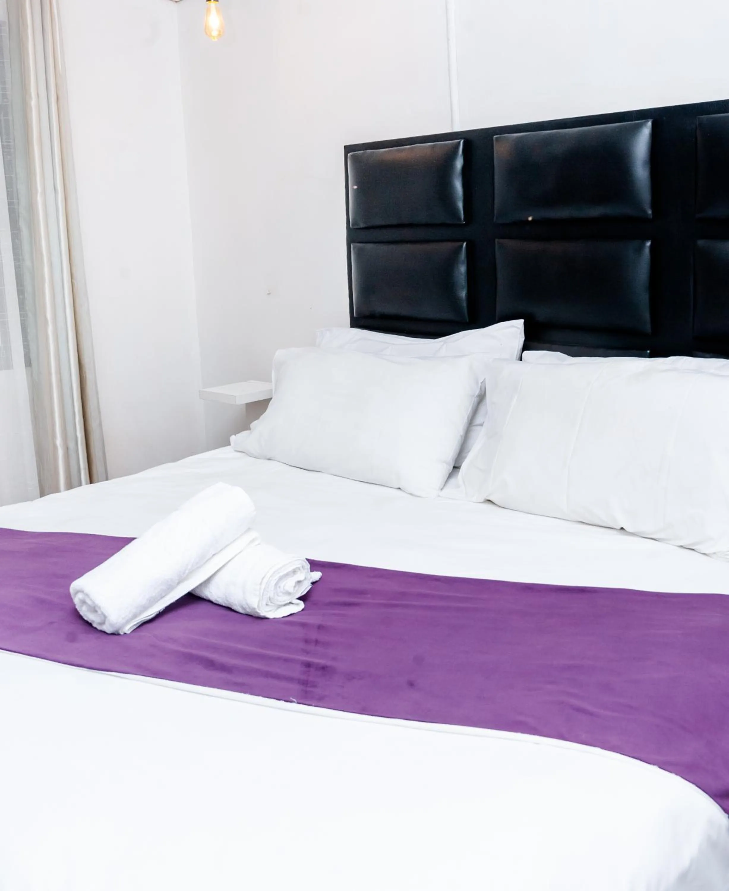 Bed in Nkosazana Guest House