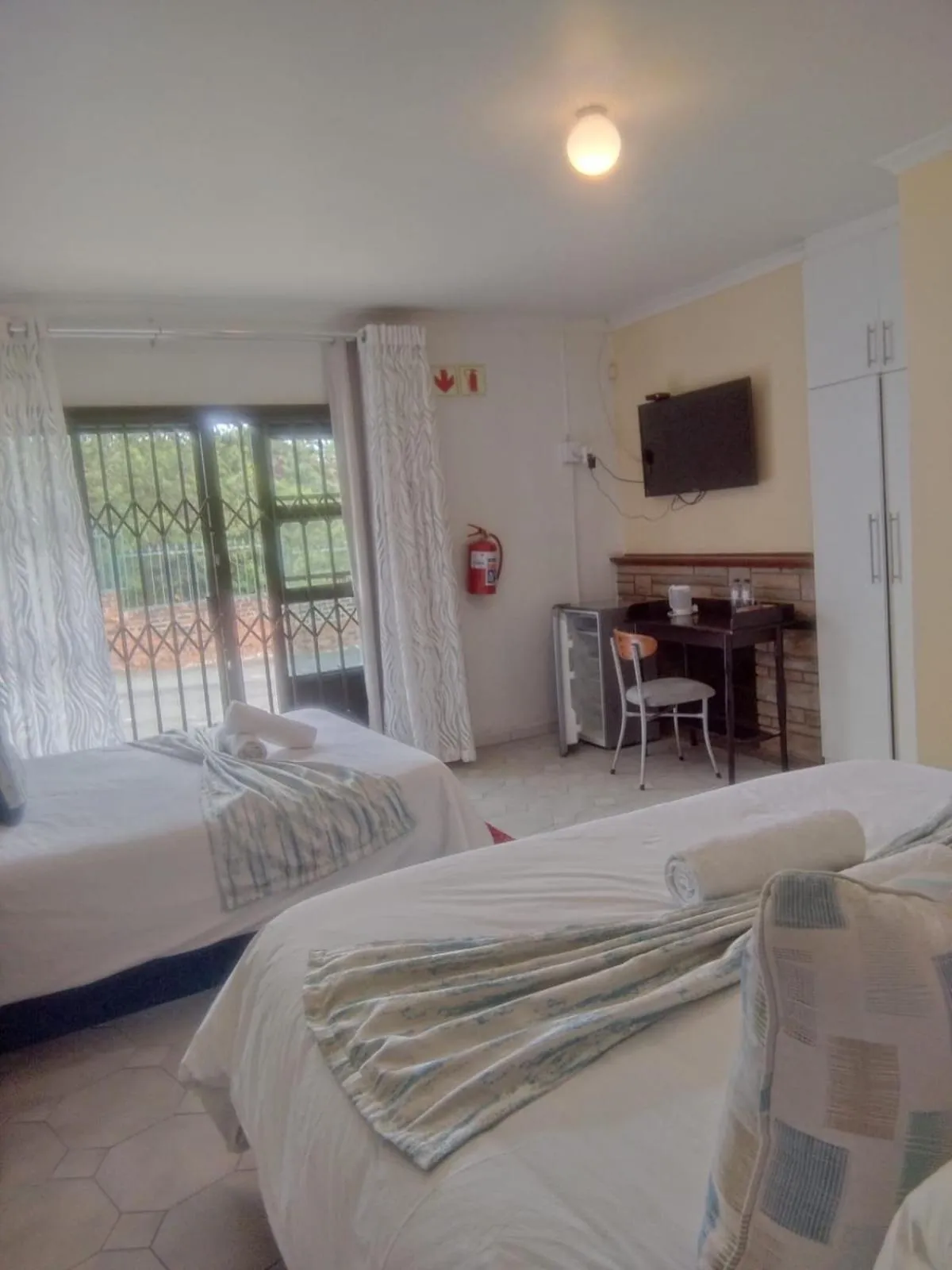 Bed in Nkosazana Guest House