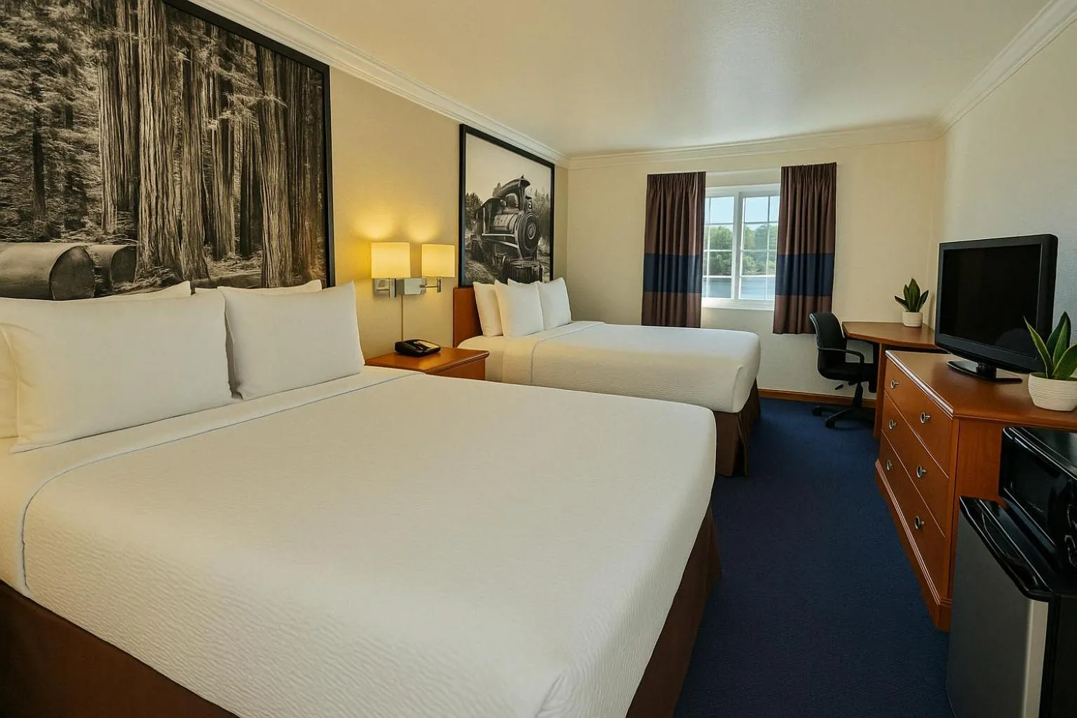 Bed in Creekside Inn & Suites