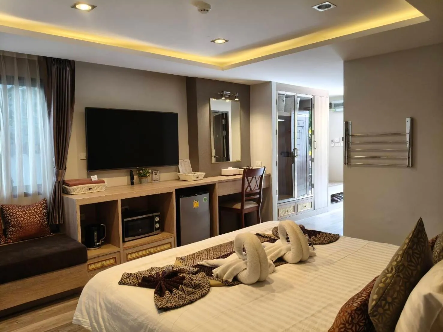 Bed in Hotel De Sripoom