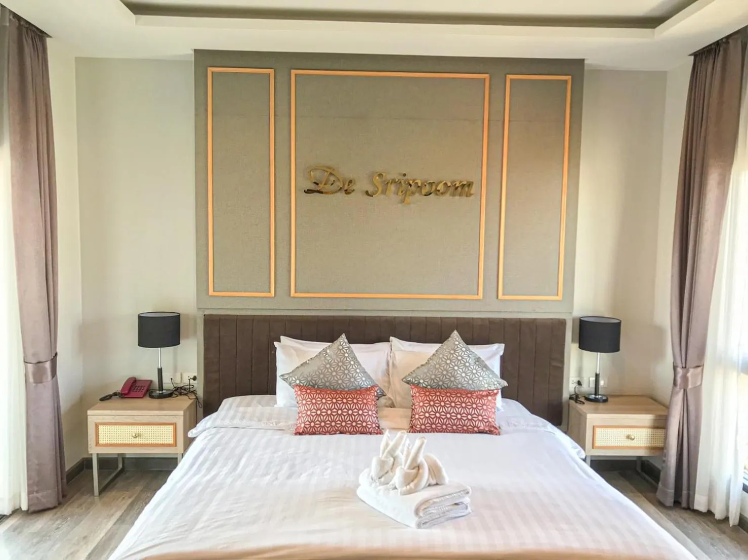 Bed in Hotel De Sripoom